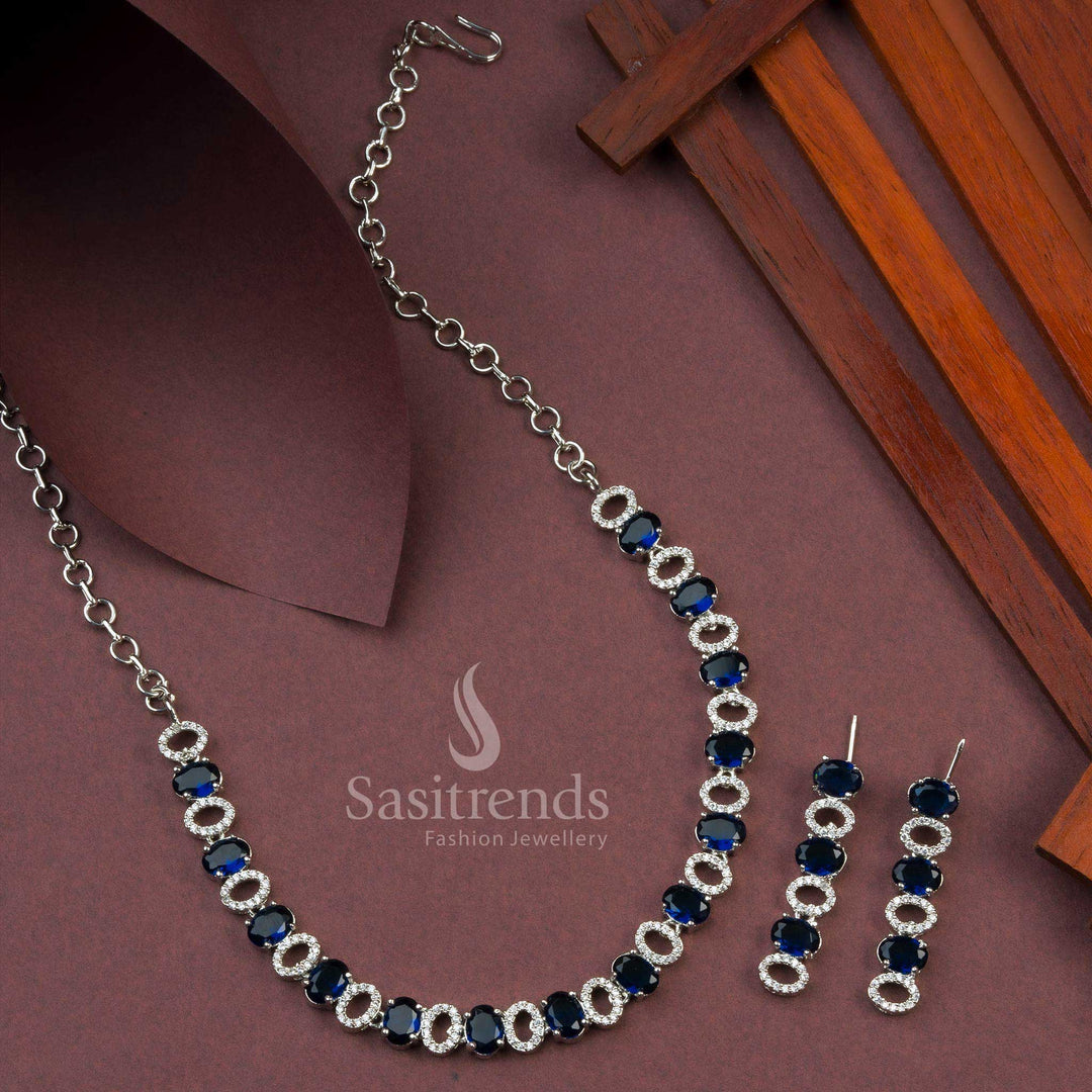 Deep blue rhodium silver oval pattern jewellery set with American diamonds, crafted for a bold and beautiful party look – Sasitrends