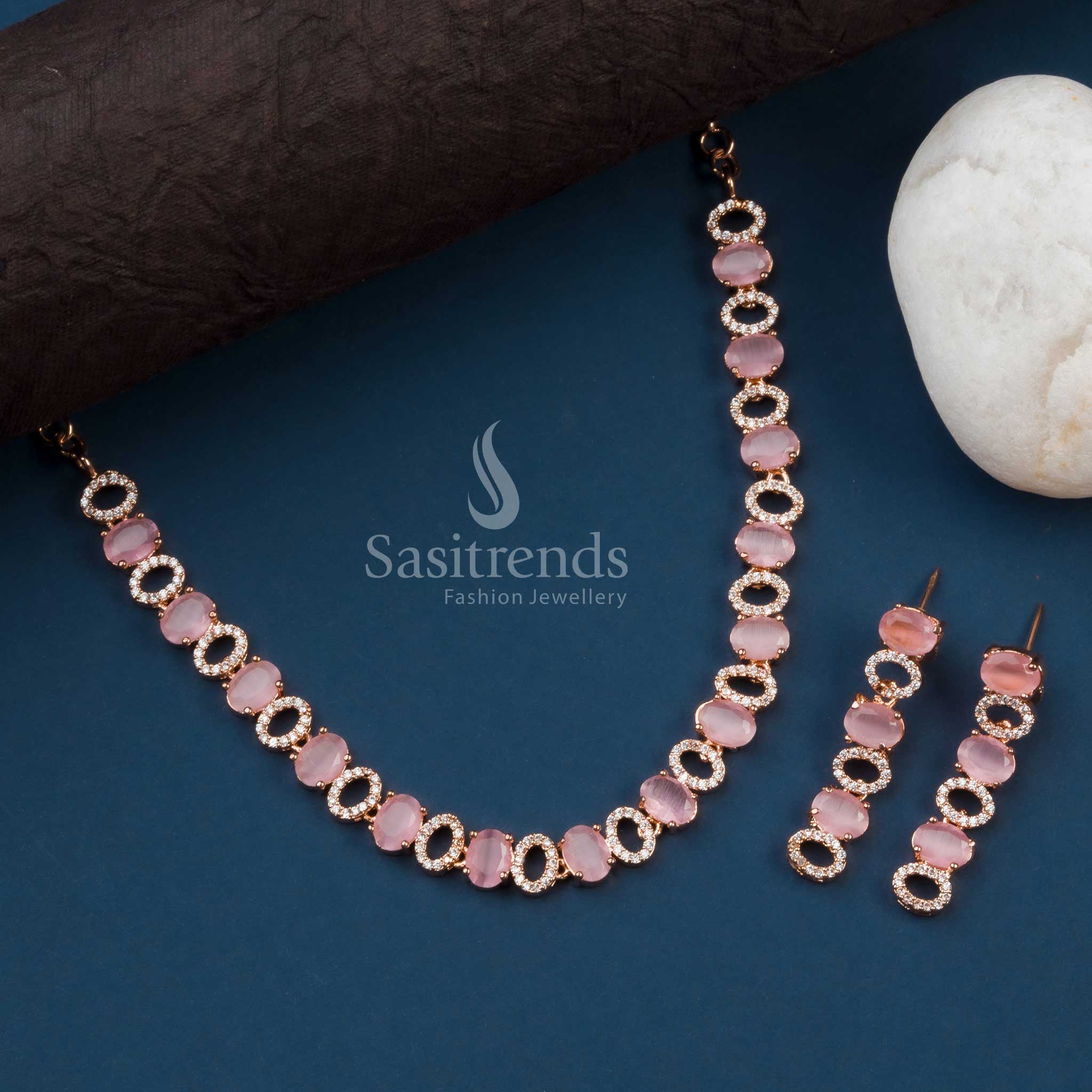 Pastel pink rose gold party jewellery set with oval design and American diamonds, perfect for a chic statement look – Sasitrends

