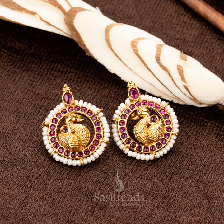 Matte Gold Plated Round Stud Earrings with Peacock Motif, Stone and Pearl Border Festive and Bridal wear- Sasitrends