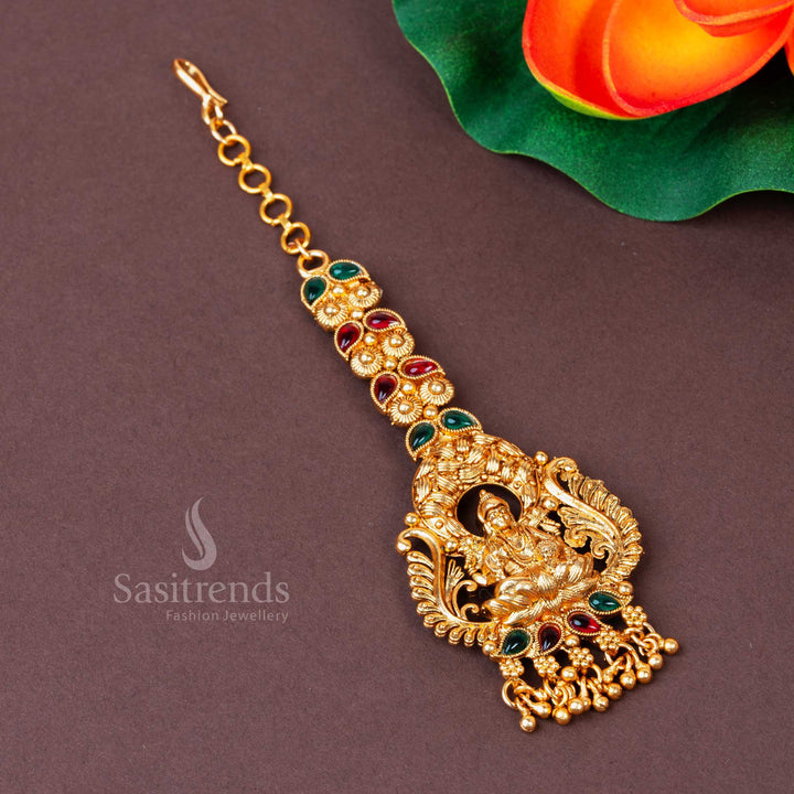 Traditional Lakshmi Motif Matte Gold Plated Classic Maang Tikka with AD Stones & Bead Drops | Sasitrends