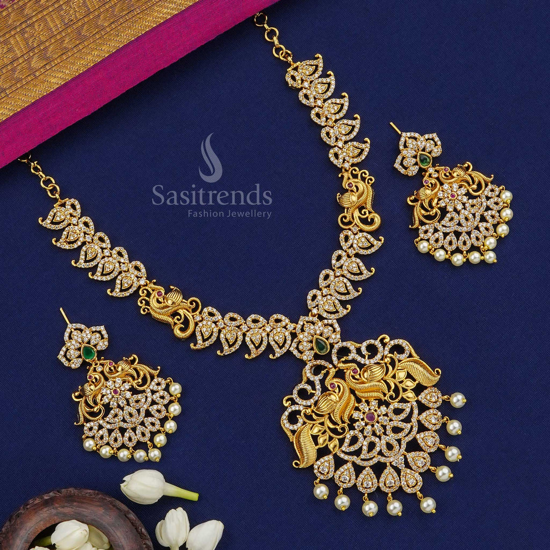 Regal peacock pendant jewellery set in temple finish with CZ sparkle and intricate detailing, matte gold radiating ethnic beauty and festive celebration touch by Sasitrends