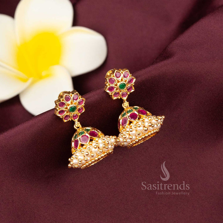 https://chatgpt.com/c/68467c30-0aa0-8012-81f4-9a643186b17a#:~:text=Glamorous%20ruby%2Dgreen%20earrings%20in%20traditional%20temple%20style%2C%20embellished%20with%20pearl%20drops%20and%20American%20diamond%20sparkle%20%E2%80%93%20Sasitrends