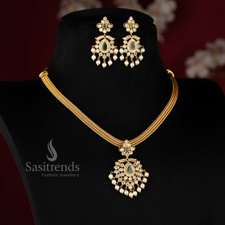 Heritage Centre green Stone Matte Gold Floral Pendant Jewellery Set With Temple Design And Festive Jhumkas – Sasitrends
