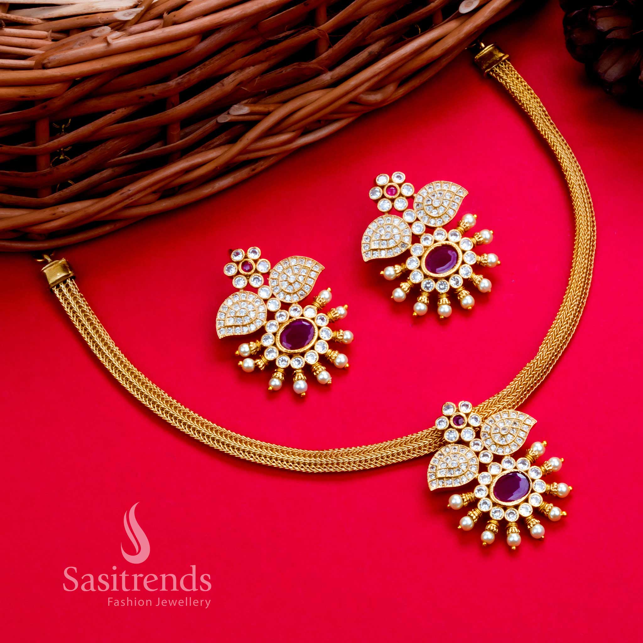 Classic temple matte gold choker jewellery set featuring a white and ruby floral pendant, designed for traditional functions and bridal glamour – Sasitrends