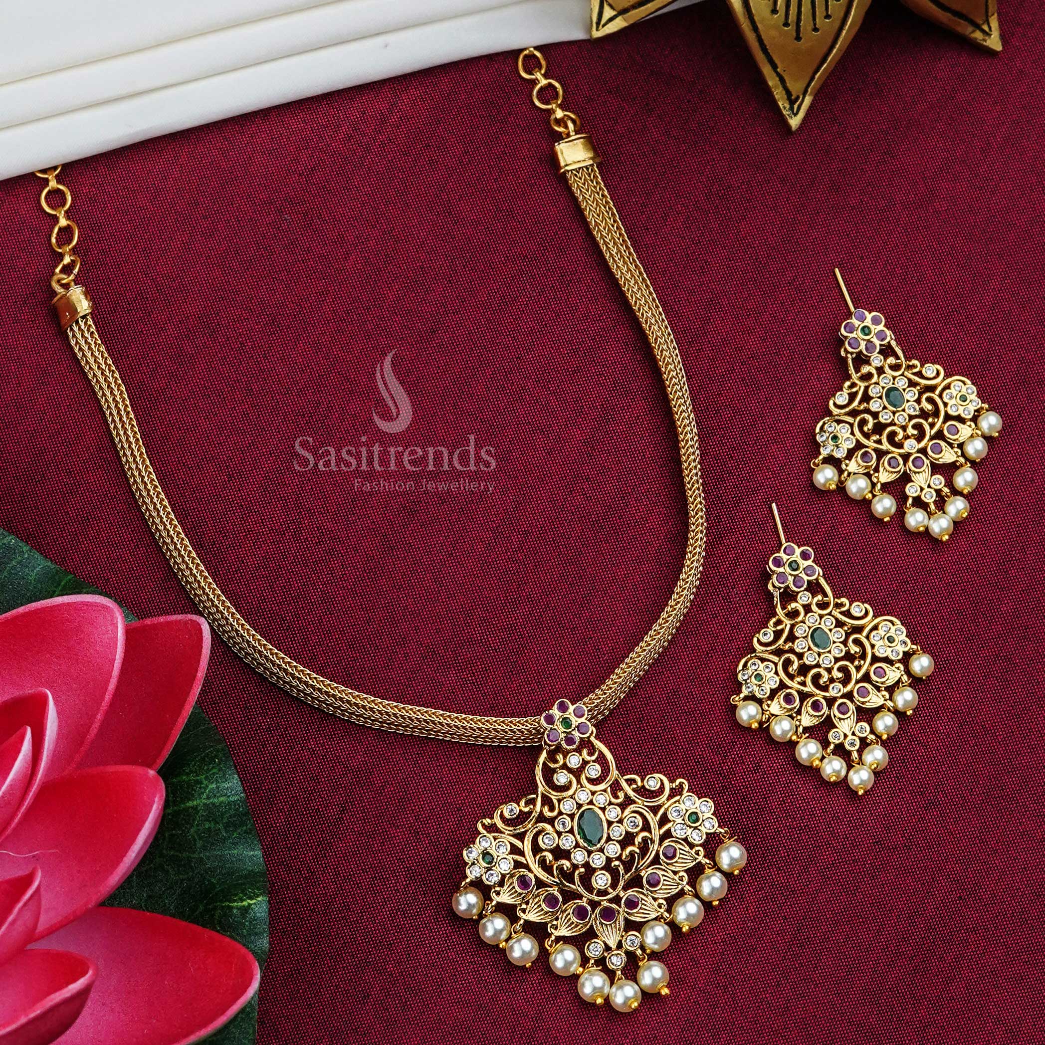 Fashionable multicolour temple matte gold floral pendant jewellery set with pearl bead drops and sparkling AD stones – vibrant ethnic elegance designed for women who love festive flair – Sasitrends