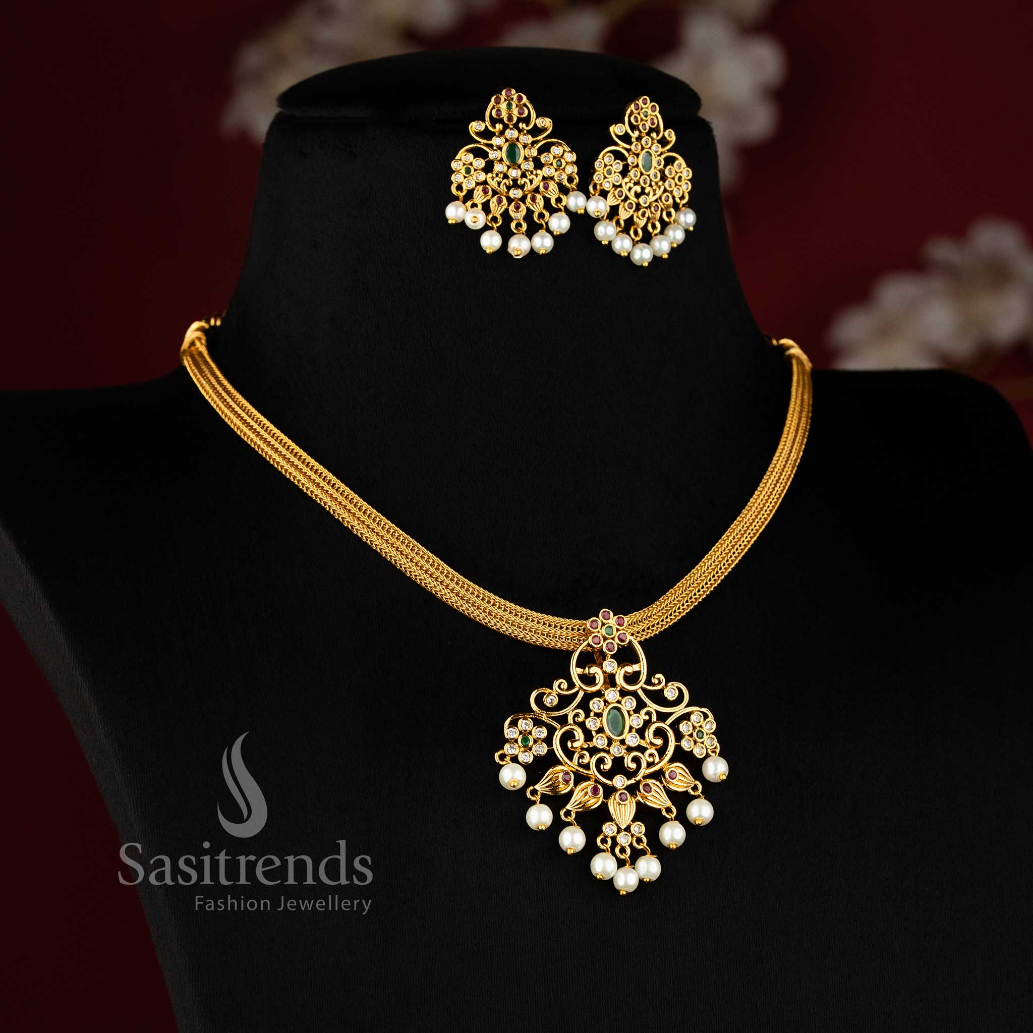 Fashionable multicolour temple matte gold floral pendant jewellery set with pearl bead drops and sparkling AD stones – Sasitrends