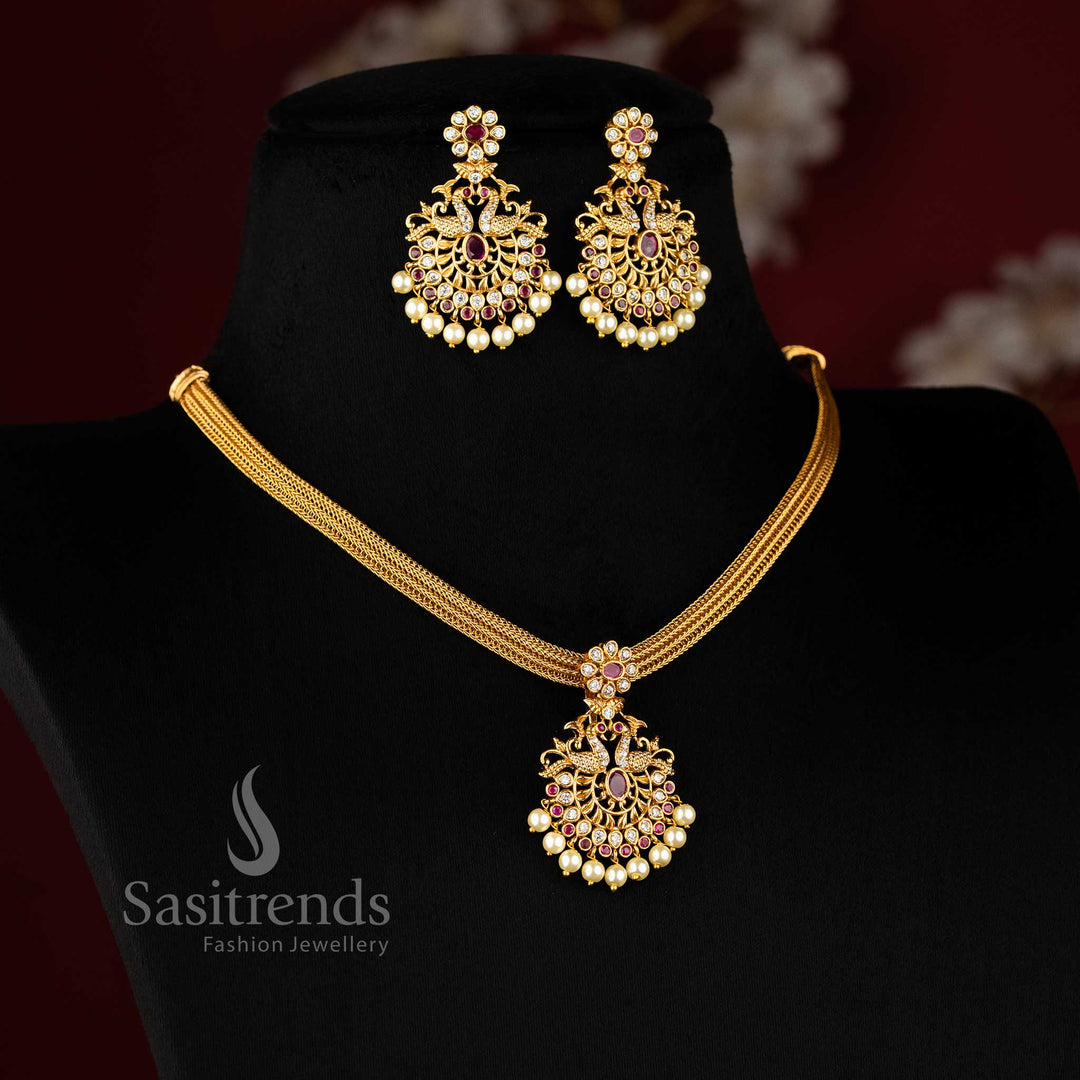 Divine White Ruby Stone Temple Gold Peacock Pendant Jewellery Set With Matte Finish And Cultural Flair  – Sasitrends