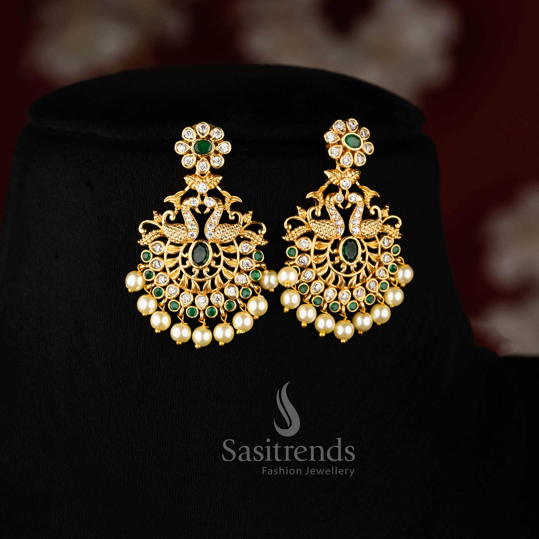Elegant White Green Stone Temple Gold Peacock Pendant Jewellery Set With Matte Finish And Cultural Flair  – Sasitrends