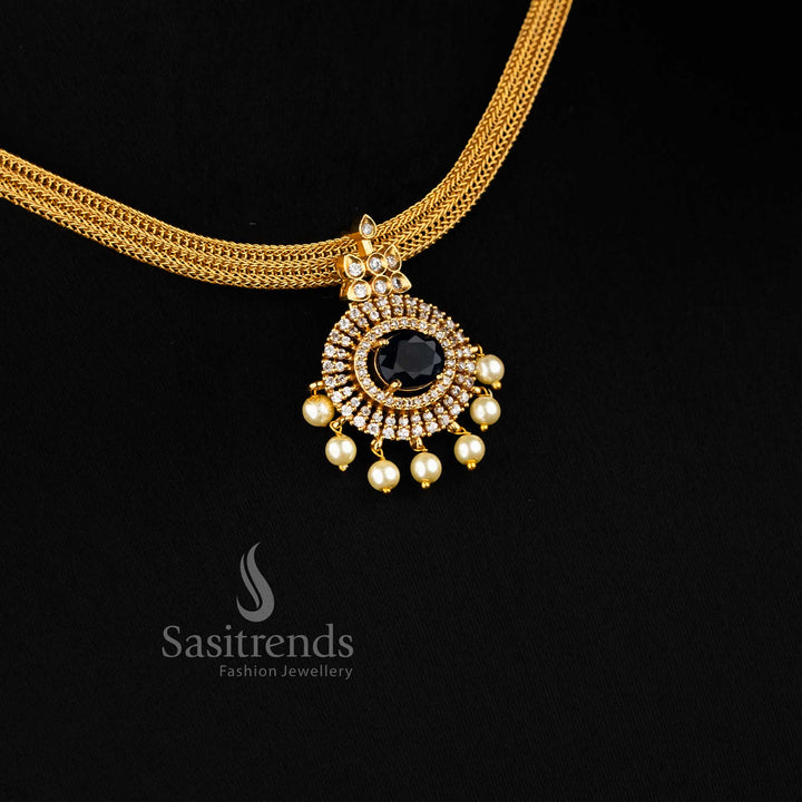 Elegant blue Attigai choker with temple-style floral pendant and matte gold finish – ideal for festive saree looks – Sasitrends
