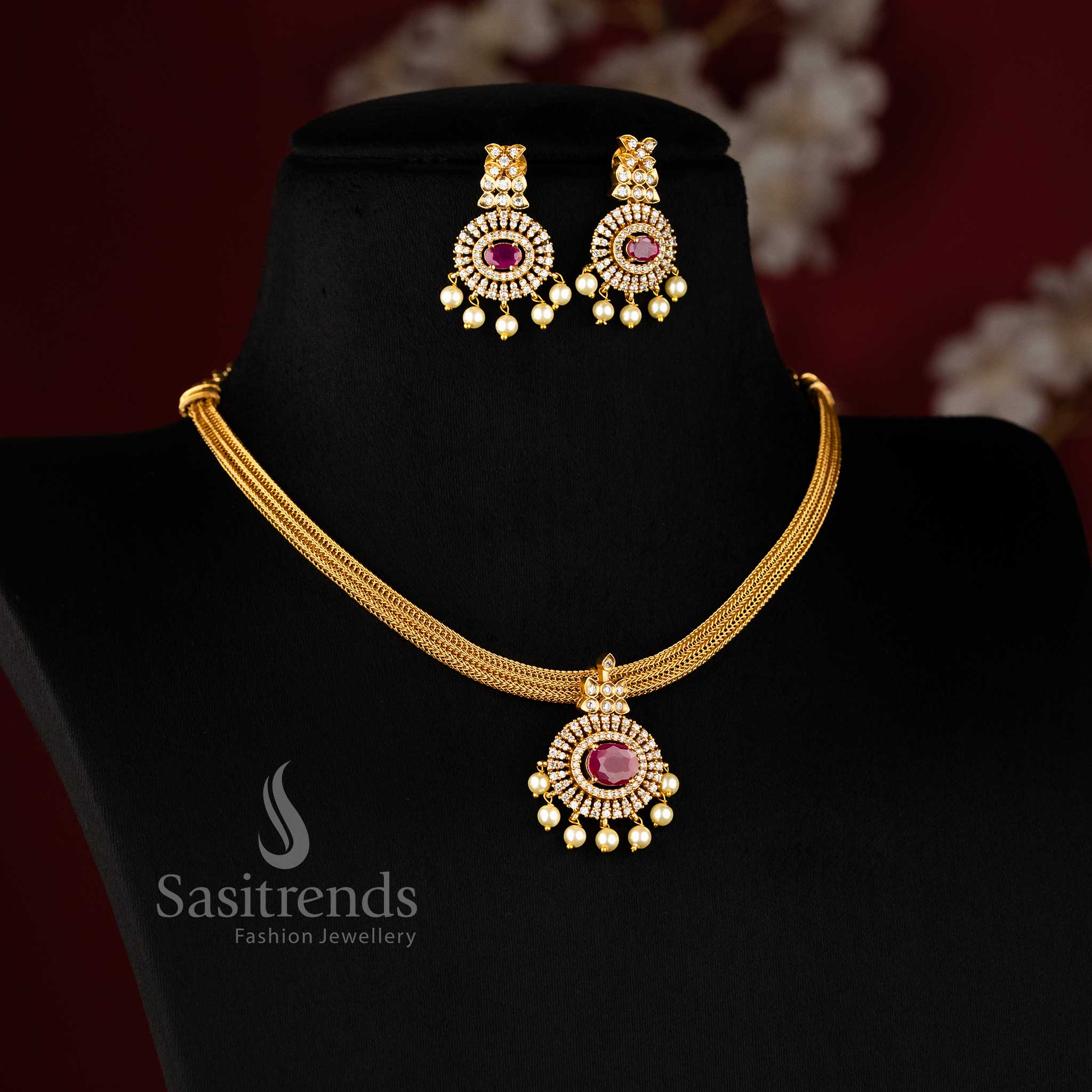 Striking ruby choker in temple matte gold plating, featuring a floral pendant and matching earrings for wedding and ethnic looks – Sasitrends