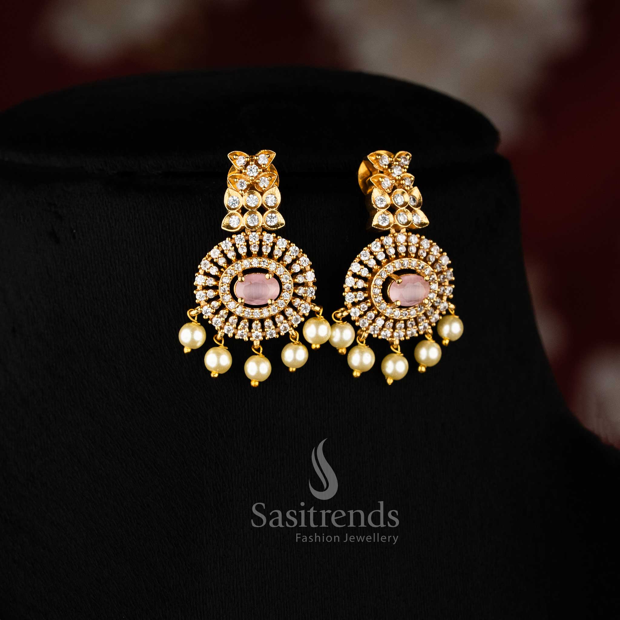 Stunning pink Attigai choker with temple-style floral pendant and matte gold finish – ideal for festive saree looks – Sasitrends
