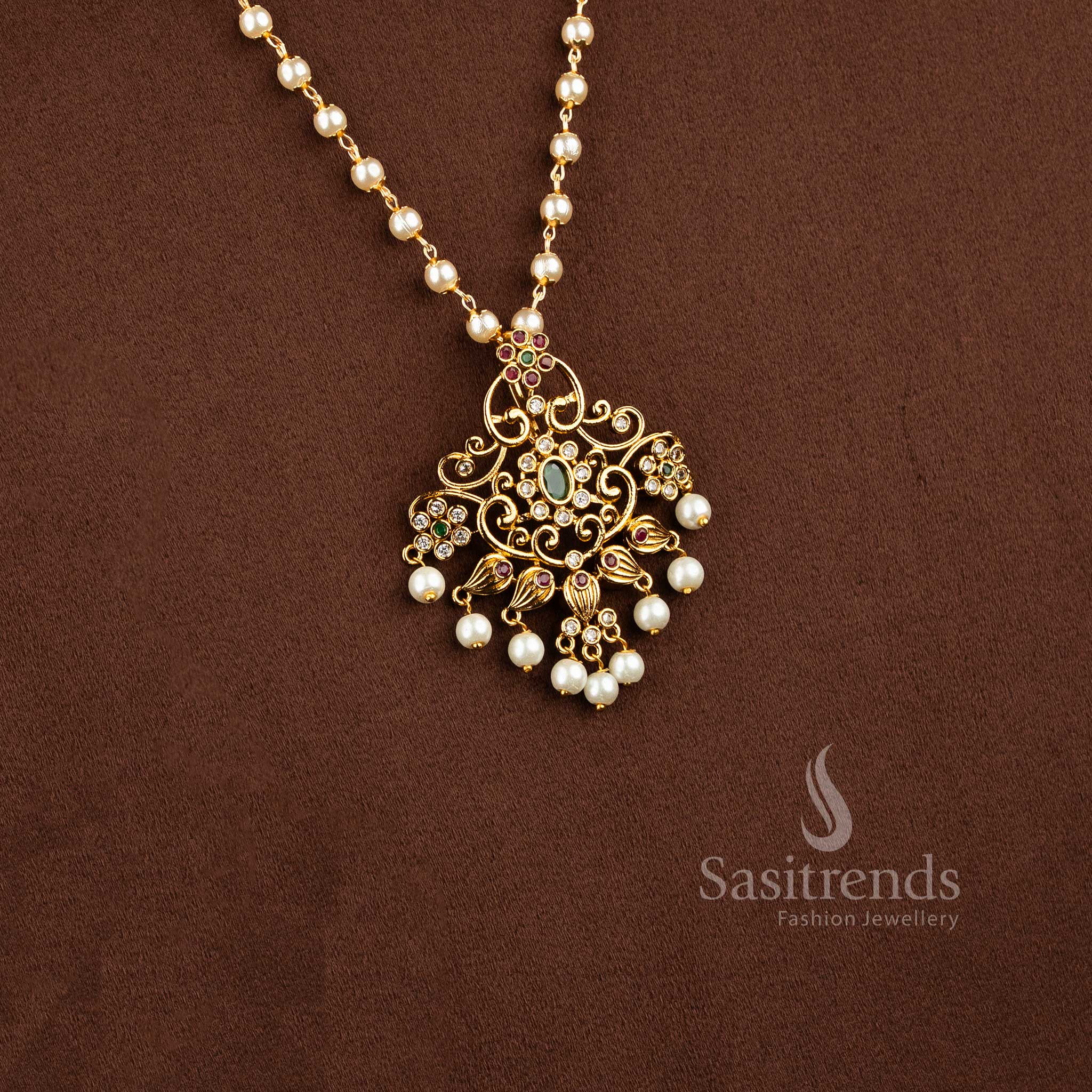 Elegant emerald and pearl pendant necklace set with multi-color American diamond stones and floral designs - Sasitrends
