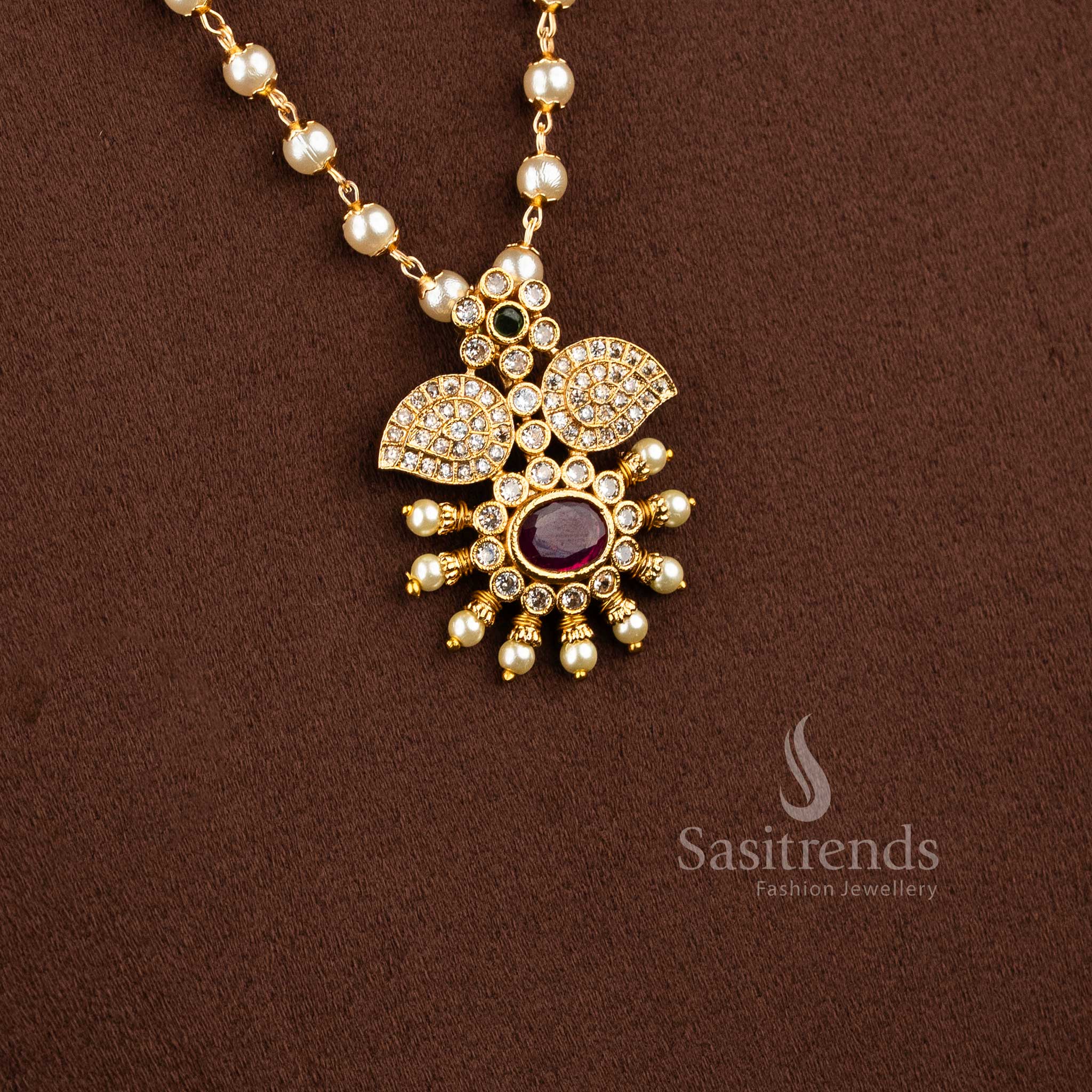 Premium matte gold plated floral petal pendant with pearl chain and ruby center 2192B - Sasitrends