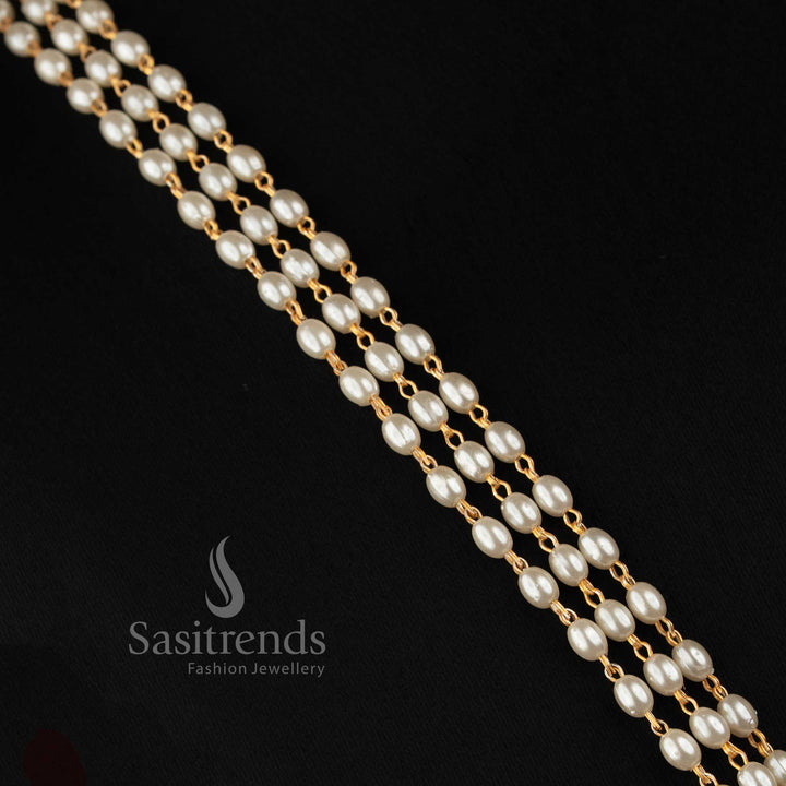 Traditional Pearl Necklace Set Featuring Ruby AD Stone Peacock Motifs and Floral Medallion Detailing - Sasitrends