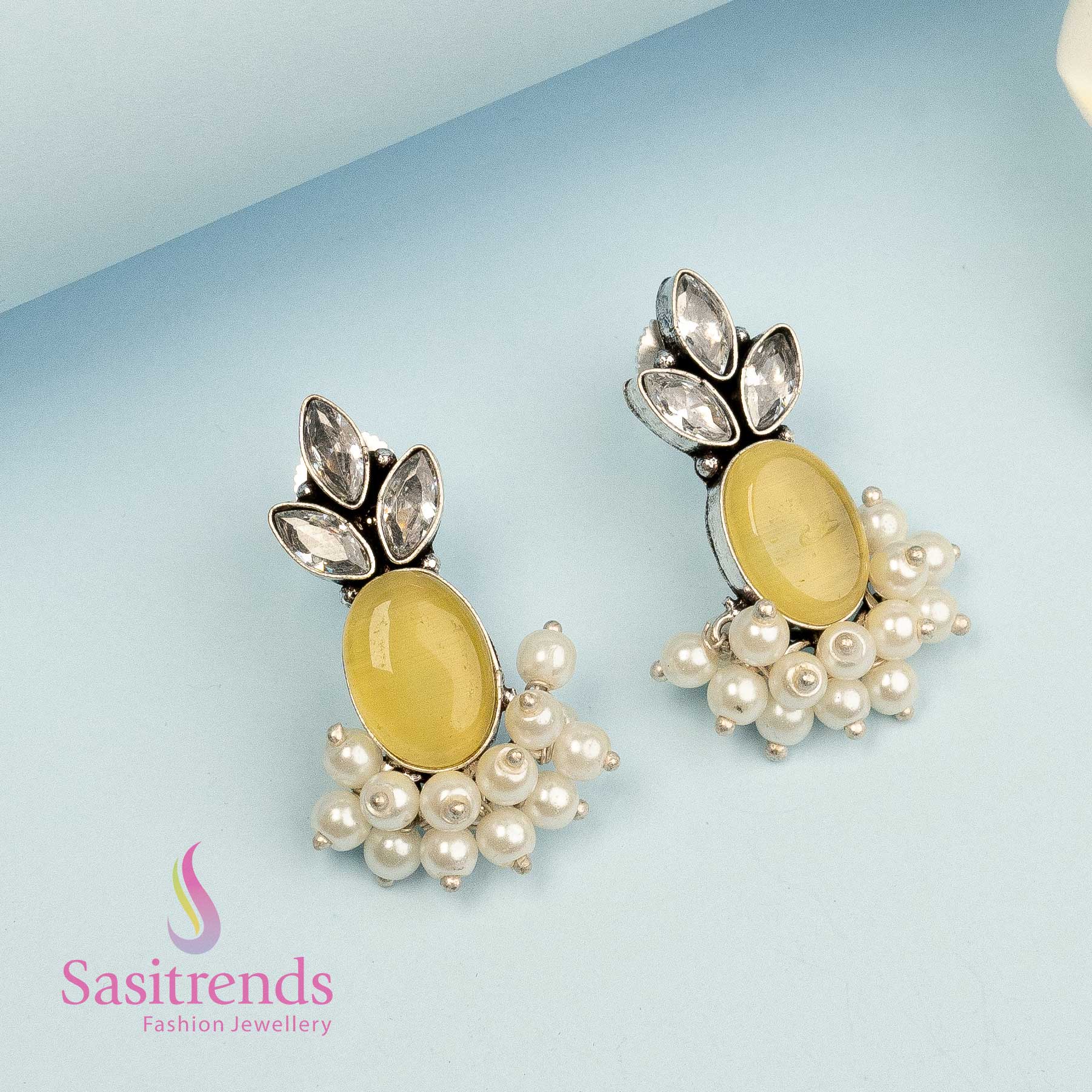Oxidised silver earrings with lemon-yellow Monalisa stone and crisp minimal outline – elegant and vibrant office jewellery pick – Sasitrends