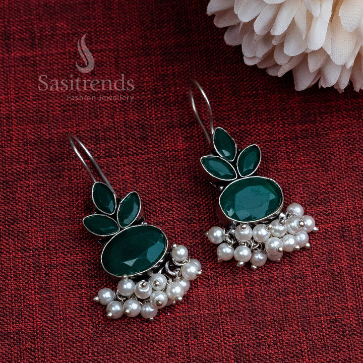 Graceful green oxidised hook stud earrings with pearl dangle and floral carved detailing – traditional jewellery with timeless appeal – Sasitrends