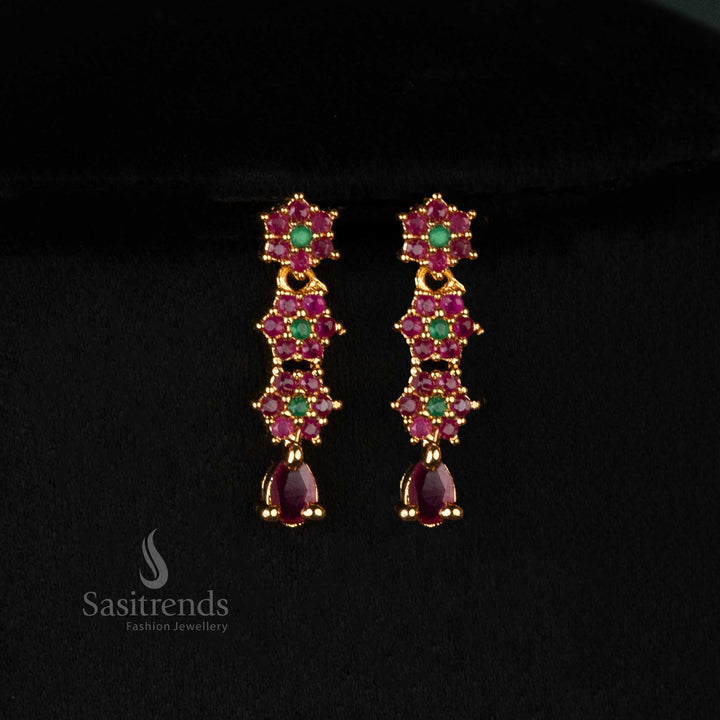 Luxurious temple-style earrings set adorned with ruby green details, floral patterns, and sparkling American diamonds - Sasitrends 