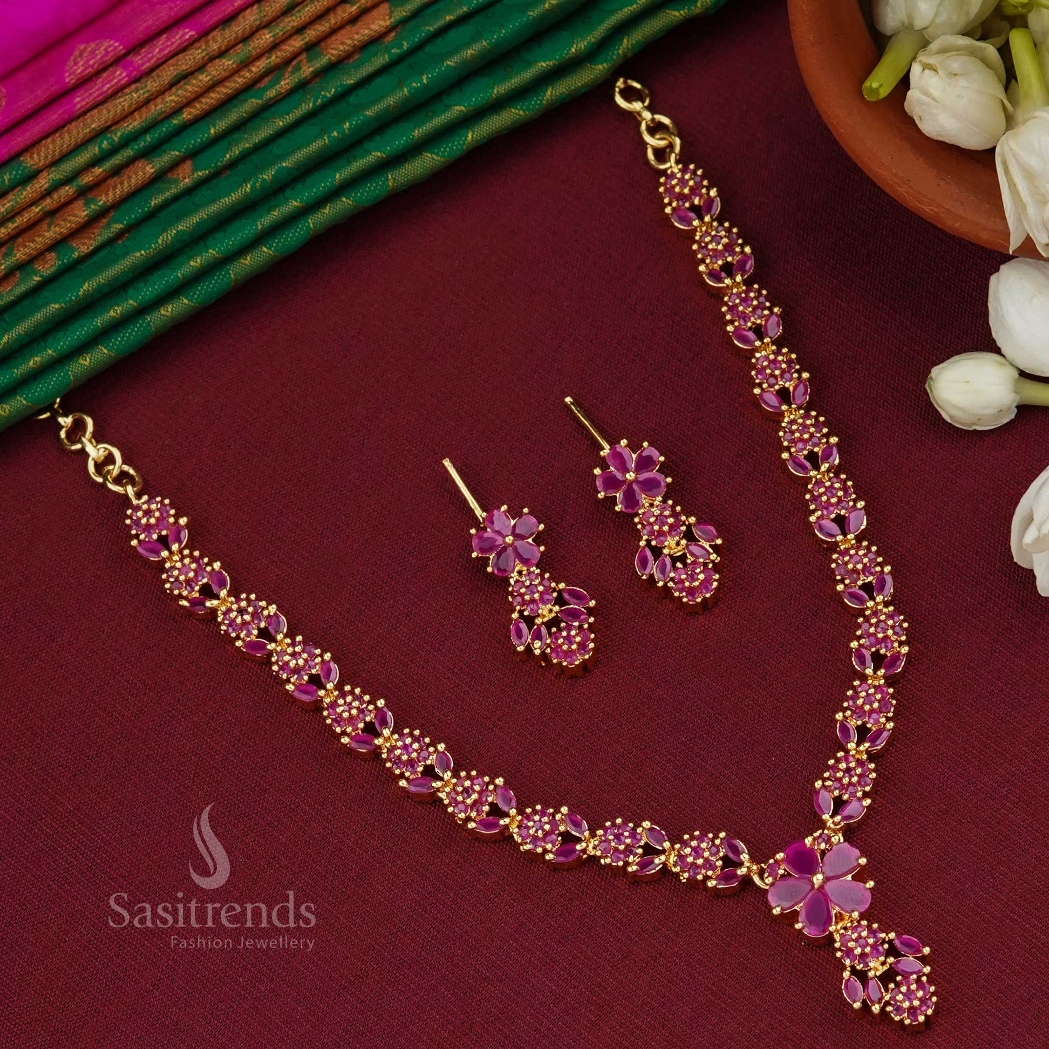 Elegant ruby red micro gold plated flower and leaf necklace jewellery set with intricate craftsmanship, designed to add charm to traditional attire - Sasitrends