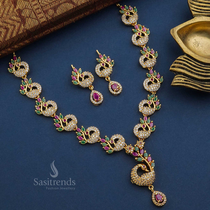 Traditional multi-toned gold plated cascading peacock design jewellery set with American diamond accents - Sasitrends