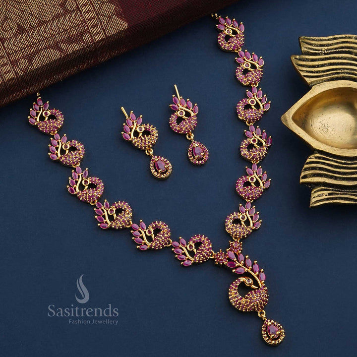 Grand ruby-hued cascading peacock micro gold plated jewellery set adorned with radiant American diamonds - Sasitrends