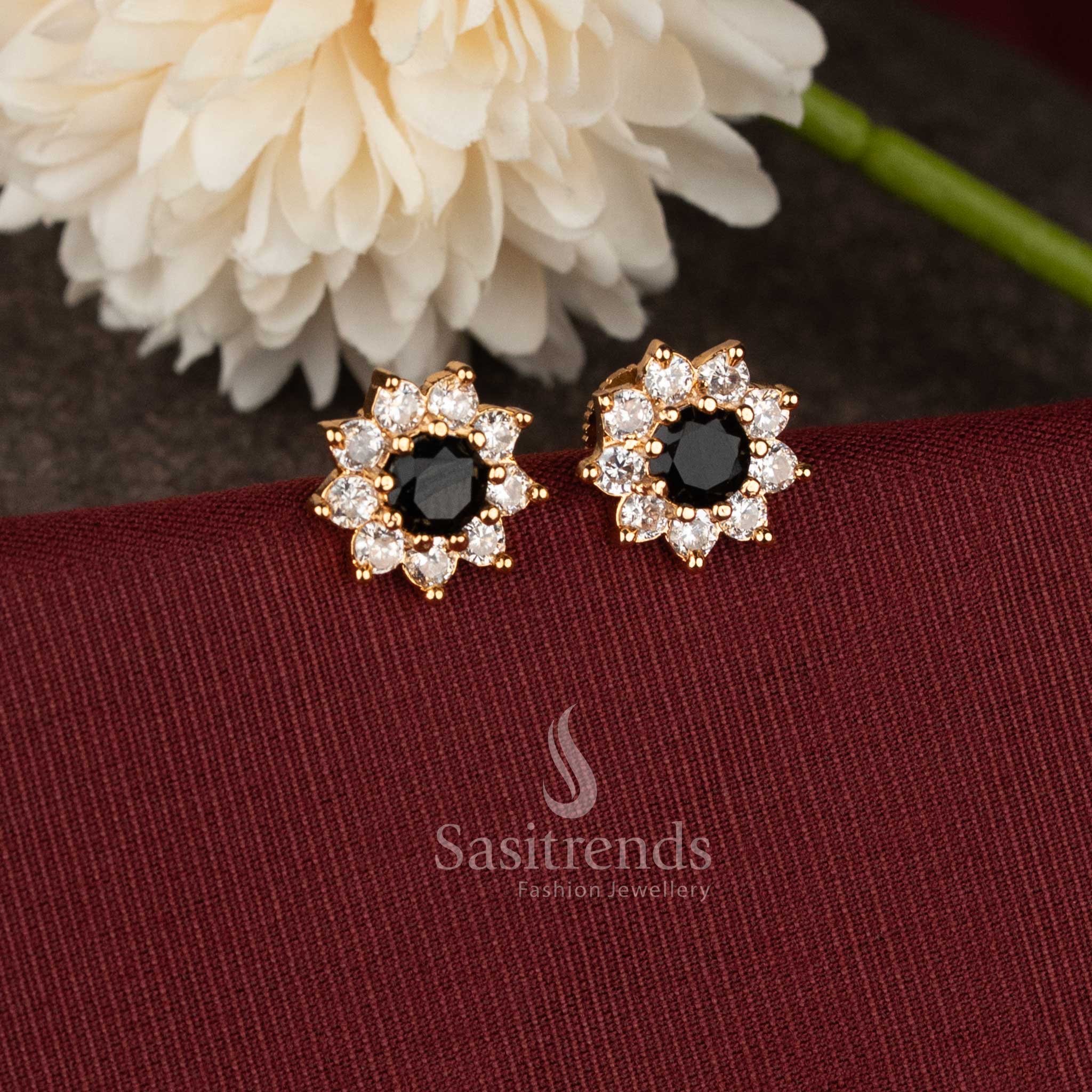 Festive wear gold plated flower earrings with black stone and sparkling AD craftsmanship - Sasitrends