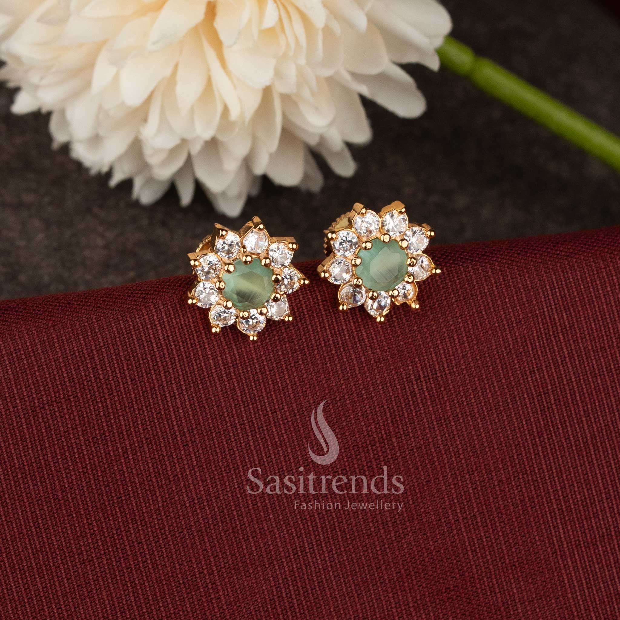 Festive wear gold plated flower earrings with mint stone and sparkling AD craftsmanship - Sasitrends