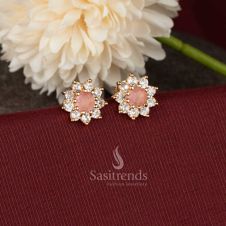 Festive wear gold plated flower earrings with pink stone and sparkling AD craftsmanship - Sasitrends