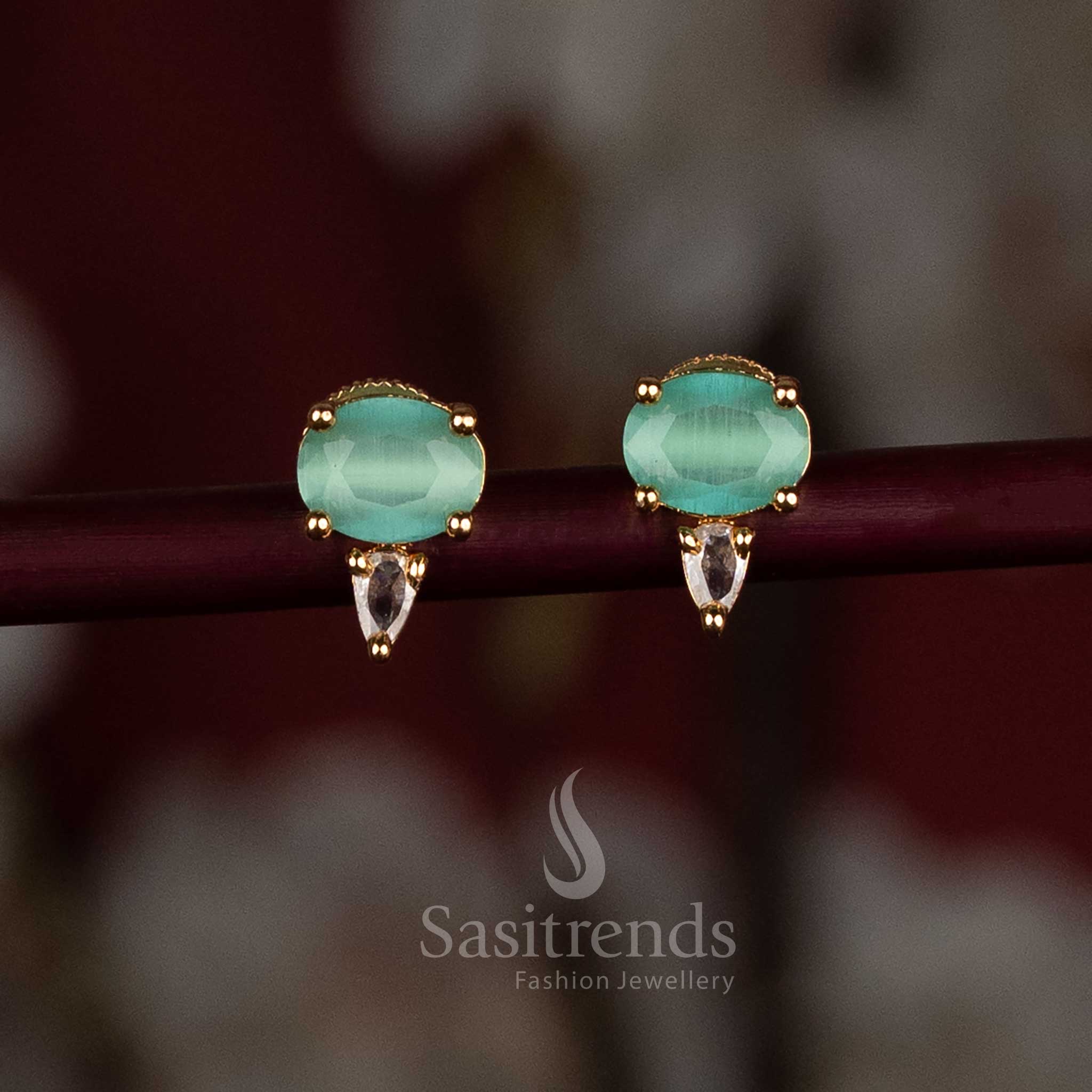 Captivating Gold-Plated American Diamond Stud Earrings in Oval and Pear Shapes with White and Blue Stones - Sasitrends