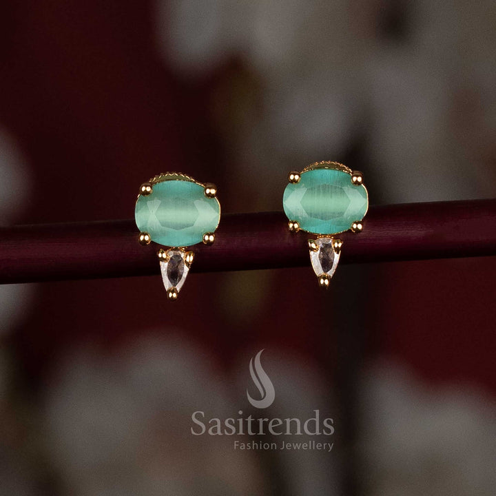 Captivating Gold-Plated American Diamond Stud Earrings in Oval and Pear Shapes with White and Blue Stones - Sasitrends