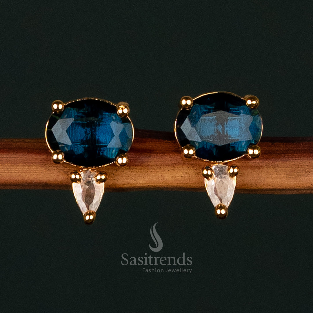 Captivating Gold-Plated American Diamond Stud Earrings in Oval and Pear Shapes with White and Blue Stones - Sasitrends