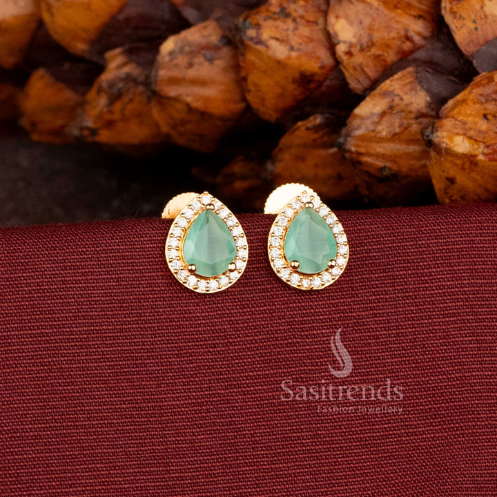 Gorgeous Gold Plated American Diamond Oval Stud Earrings with Detailed Stone Work Sasitrends