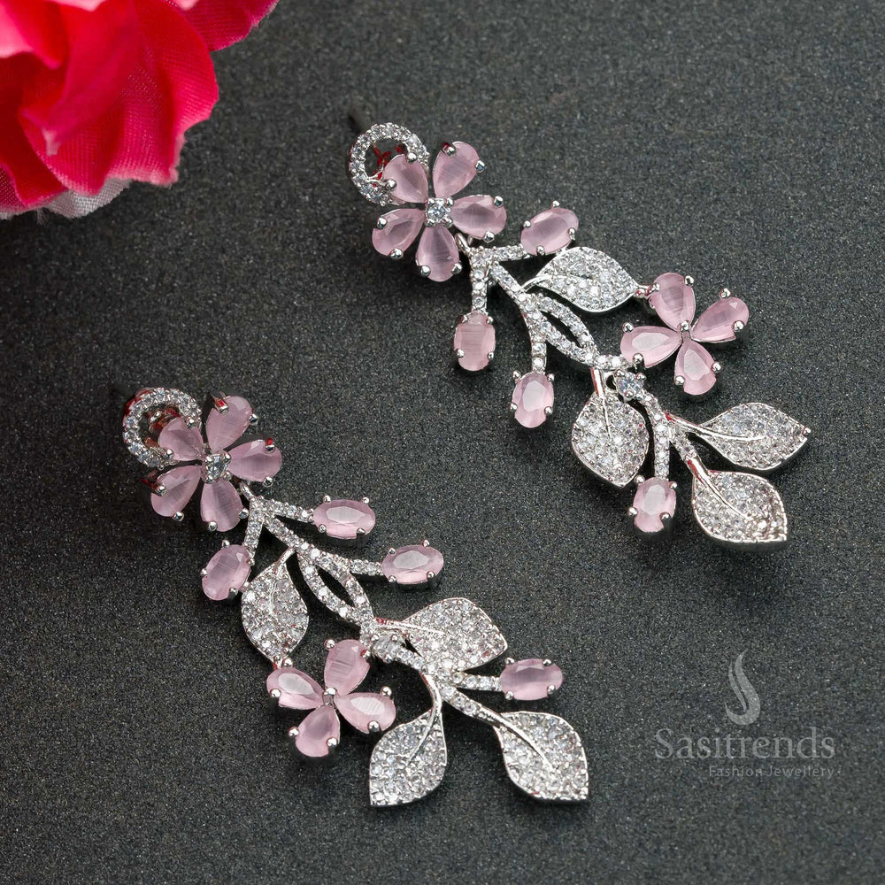 Elegant rhodium-plated pink stone floral earrings adorned with sparkling American Diamonds – a statement party wear jewellery piece for modern fashionistas – Sasitrends
