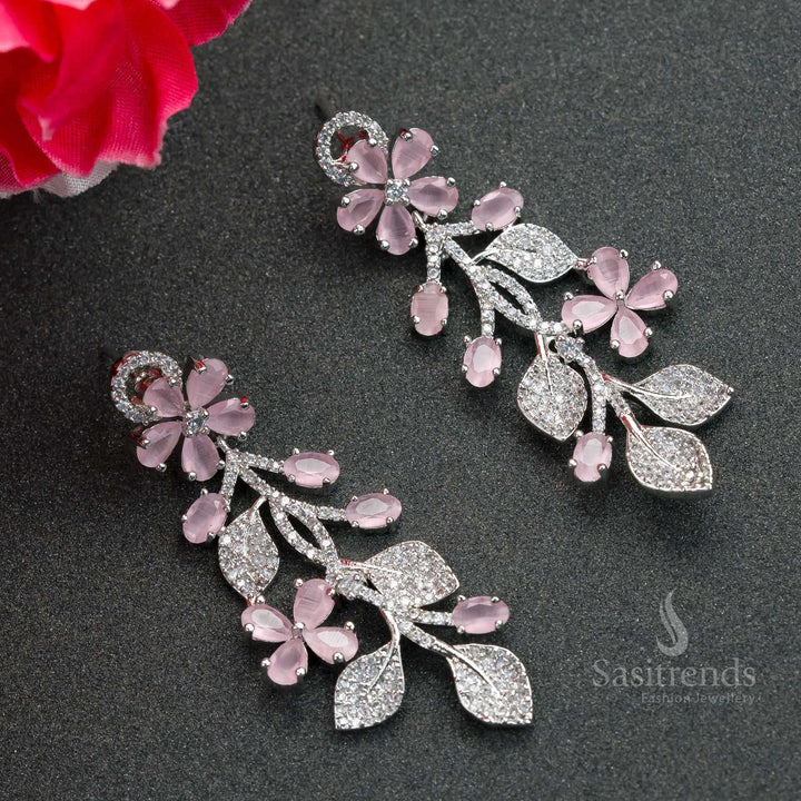 Elegant rhodium-plated pink stone floral earrings adorned with sparkling American Diamonds – a statement party wear jewellery piece for modern fashionistas – Sasitrends