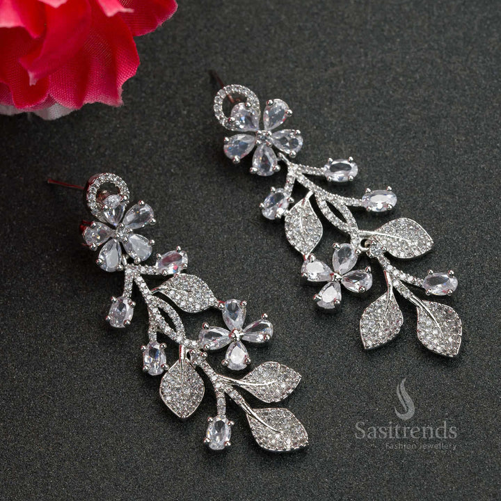 Pure white AD stone-studded flower earrings in rhodium silver – versatile party wear jewellery that complements every ensemble with sophistication – Sasitrends


