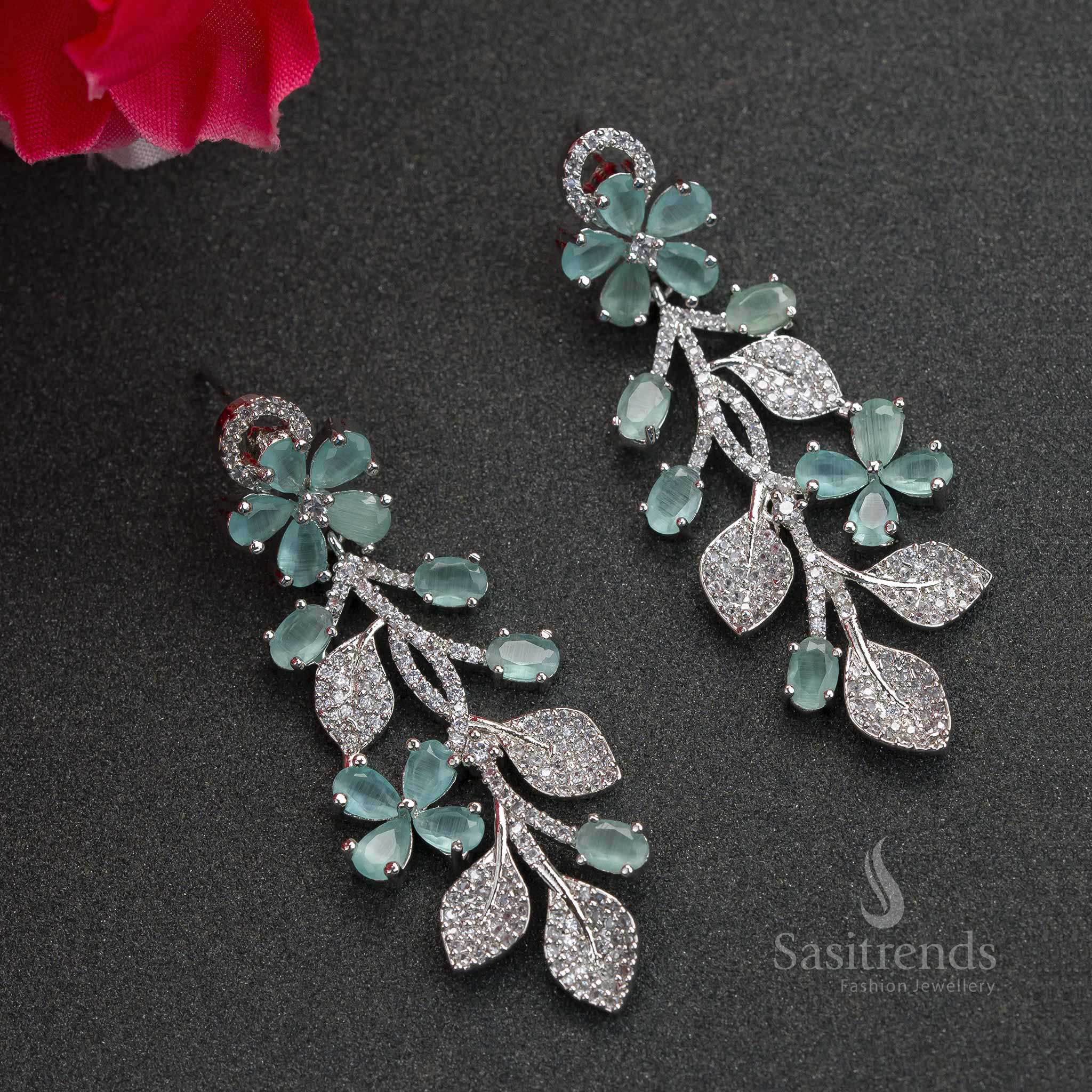 Mint green floral rhodium earrings with American Diamond stones – trendy cool-tone jewellery perfect for party glam and ethnic fusion fashion – Sasitrends