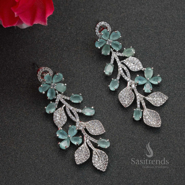 Mint green floral rhodium earrings with American Diamond stones – trendy cool-tone jewellery perfect for party glam and ethnic fusion fashion – Sasitrends