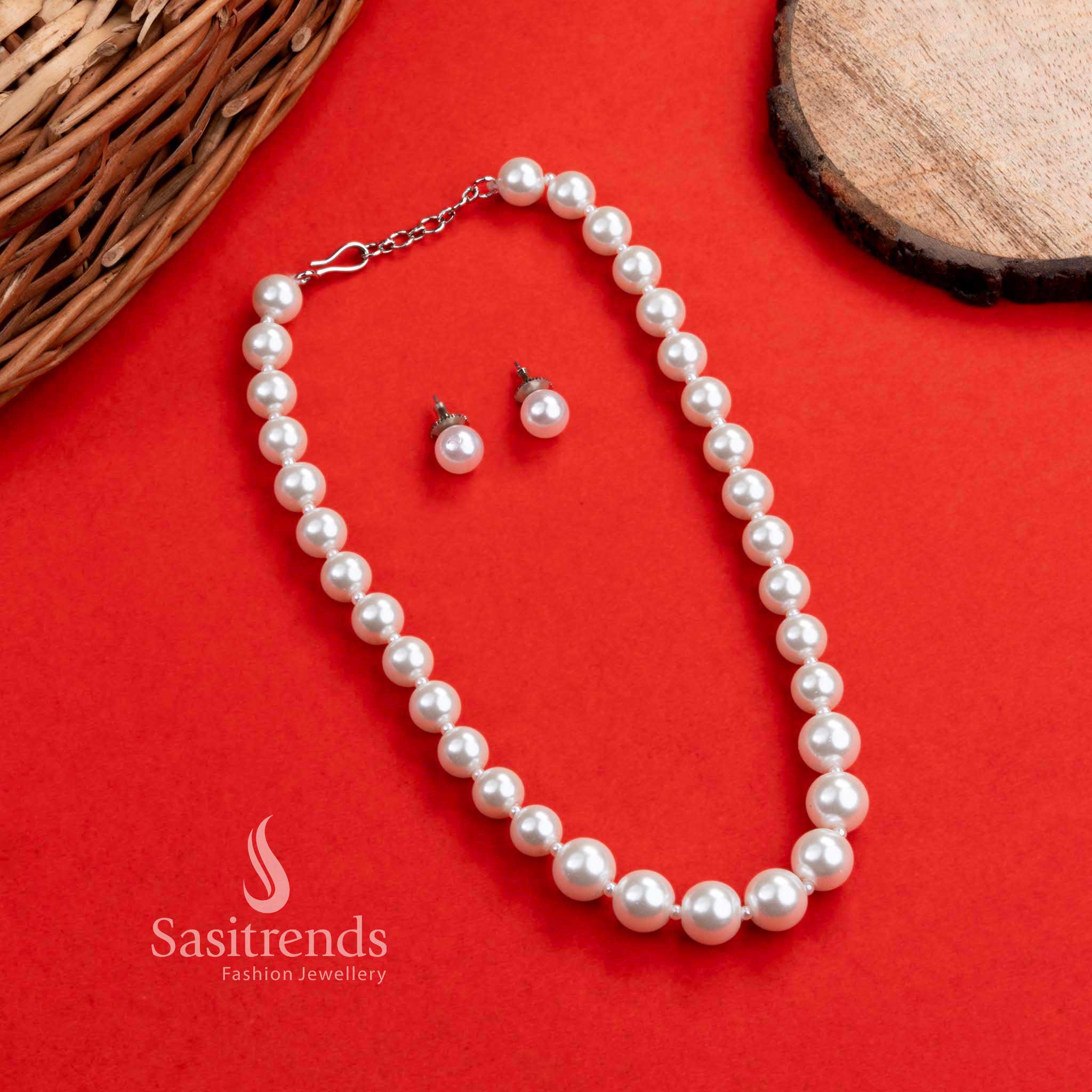 Elegant Regal Pearl Mala Necklace with Matching Push-Back Earrings, showcasing a pristine white color in a trendy design, perfect for adding a touch of royalty to your style from Sasitrends.