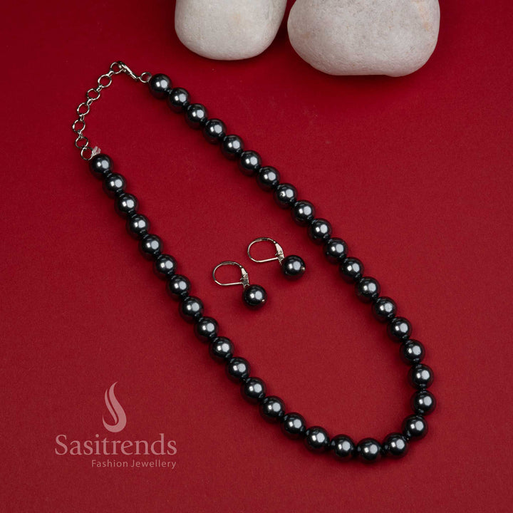 Bold and stylish dark-grey shell pearl necklace mala set with coordinating earrings – a modern statement for ethnic and party wear – Sasitrends