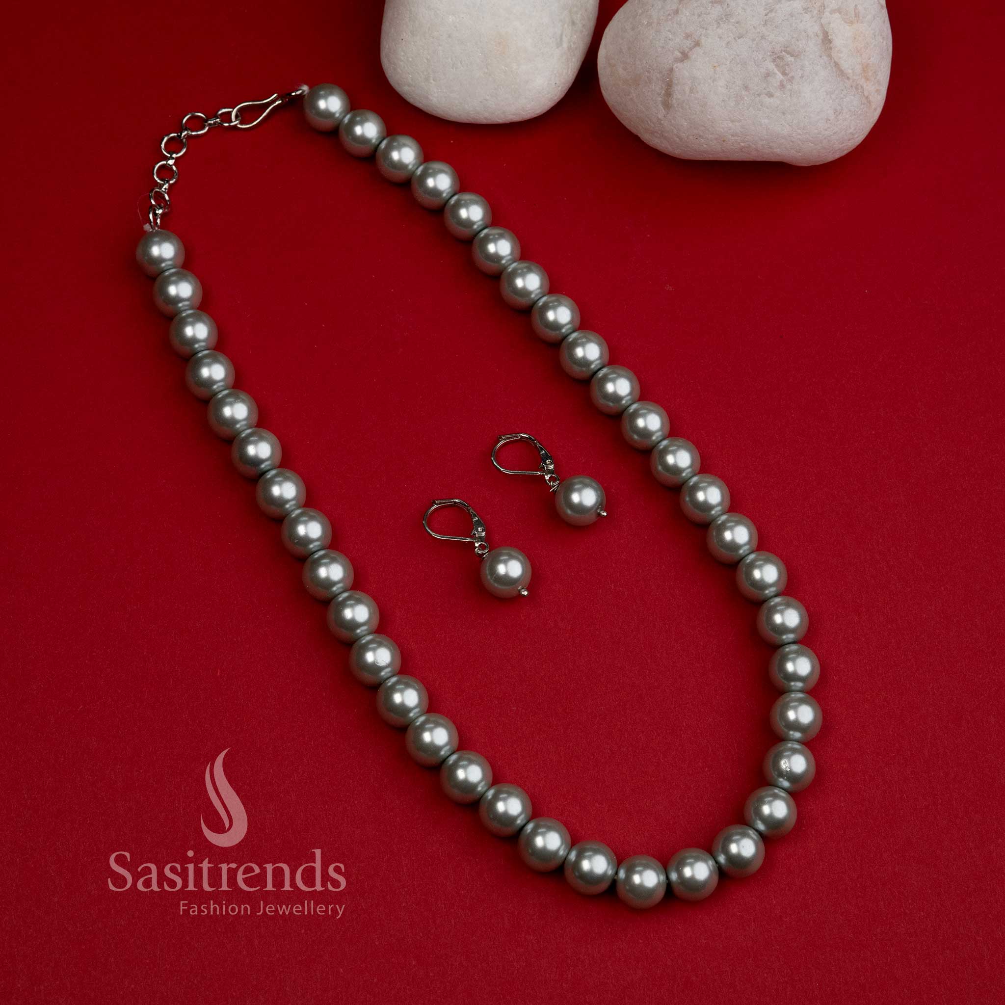 Shimmering silver-grey shell pearl mala set with elegant earrings – a luxurious choice for grand celebrations and saree styling – Sasitrends
