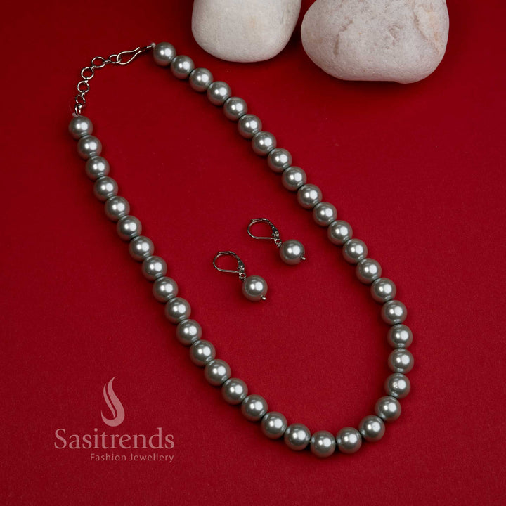 Shimmering silver-grey shell pearl mala set with elegant earrings – a luxurious choice for grand celebrations and saree styling – Sasitrends