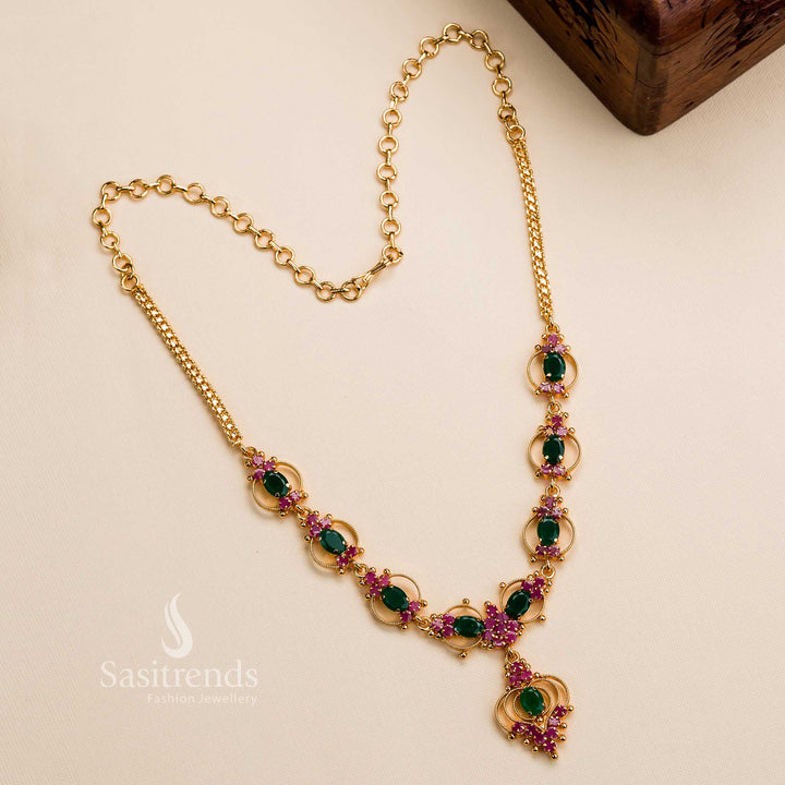 Gorgeous micro gold plated necklace featuring sparkling American diamond stones, ideal for traditional and ethnic wear in a green-ruby color combination- Sasitrends