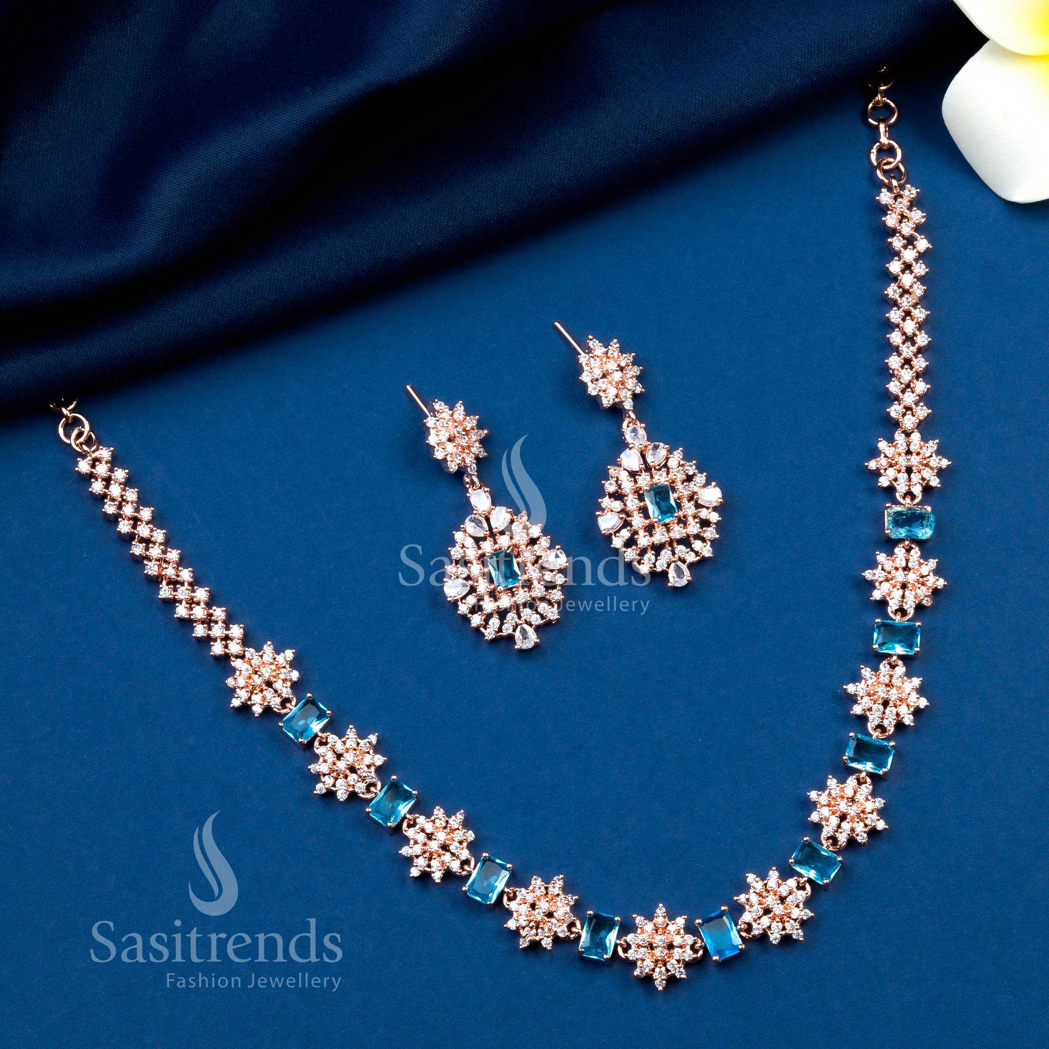 Sky blue rose gold floral party wear jewellery set with American diamonds, radiating dreamy shine and elegance – Sasitrends