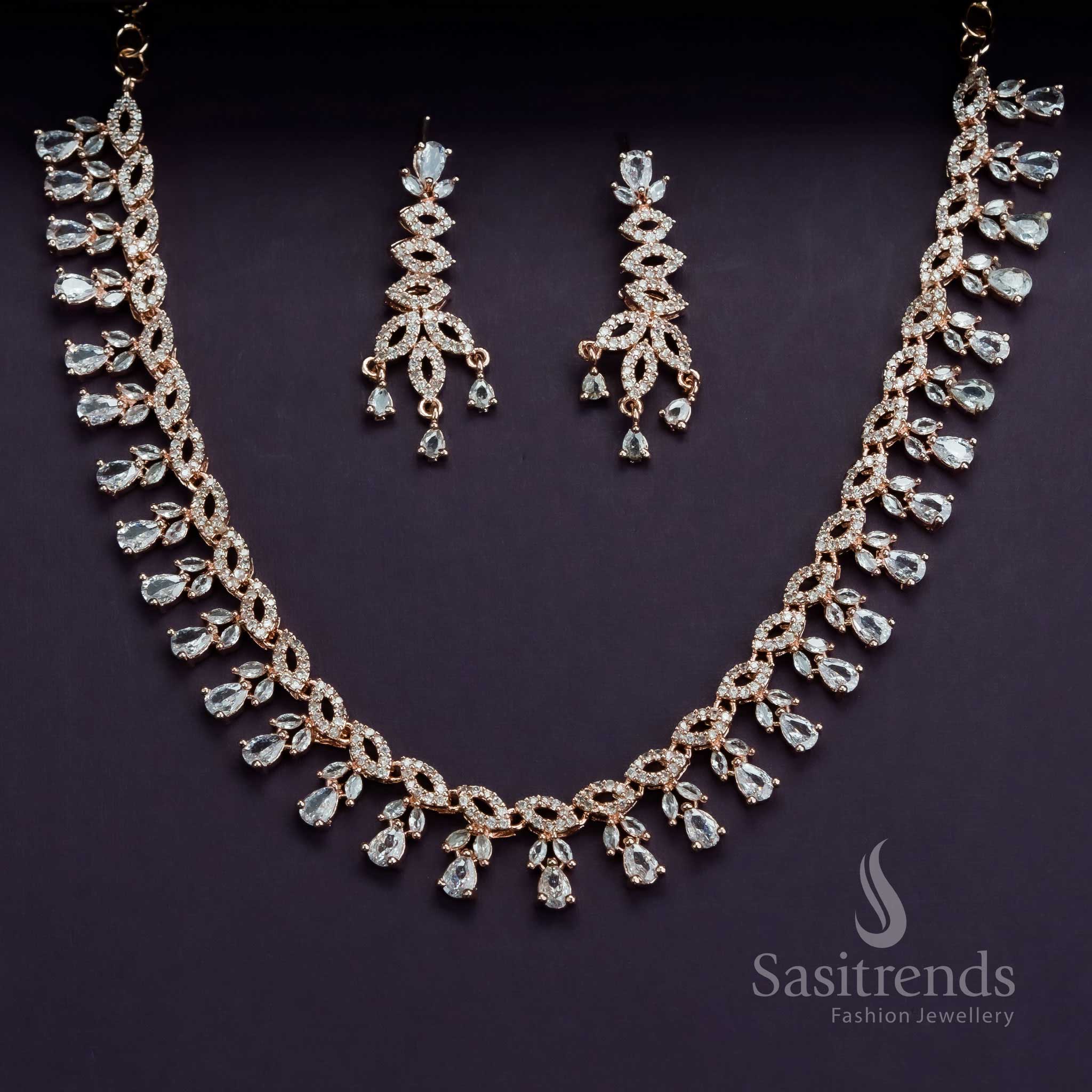 Pure white party wear jewellery set in rose gold finish, featuring elegant floral patterns and shiny American diamond stones – Sasitrends