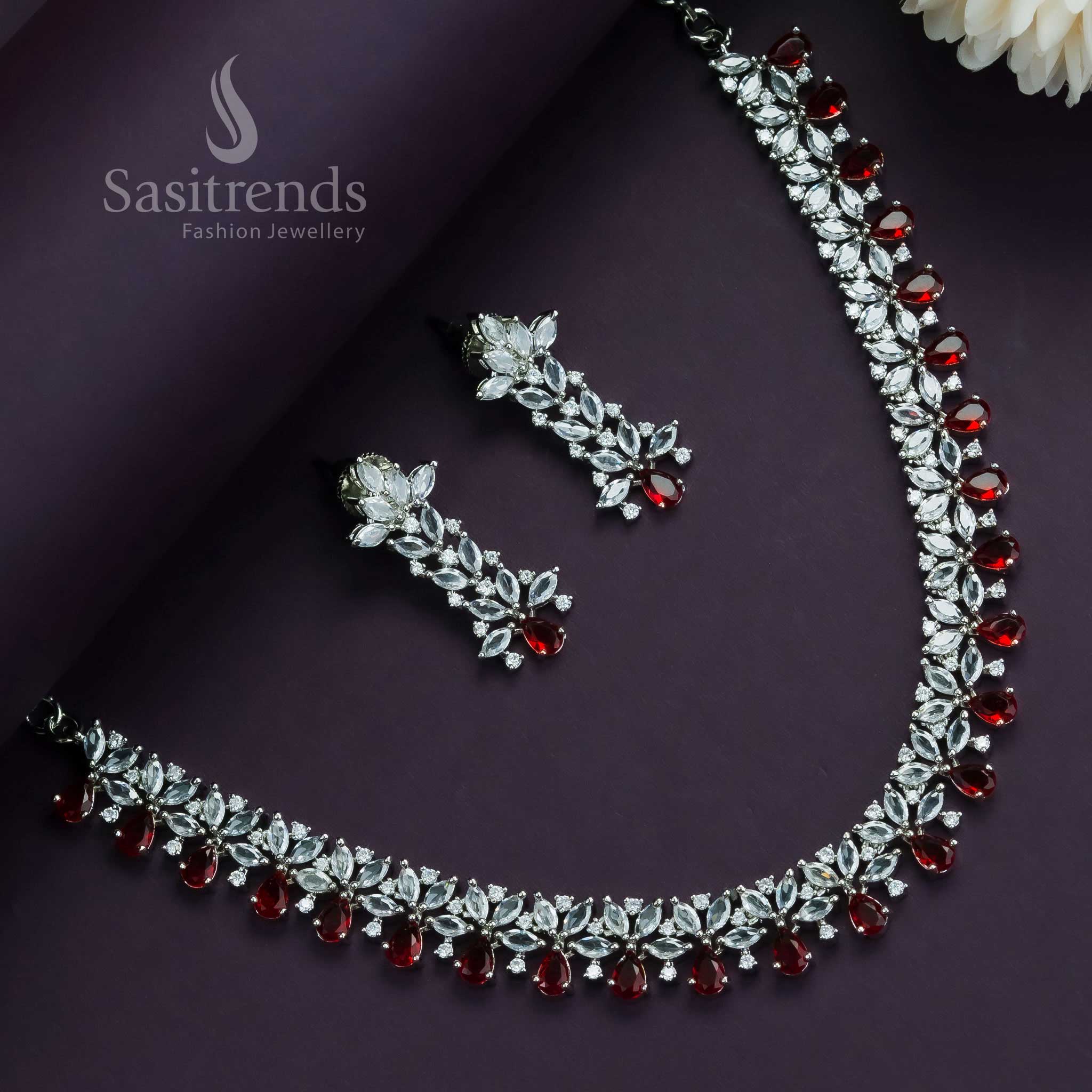 Vibrant red floral jewellery set with rhodium silver finish and American diamonds, crafted for bold and glamorous party wear – Sasitrends