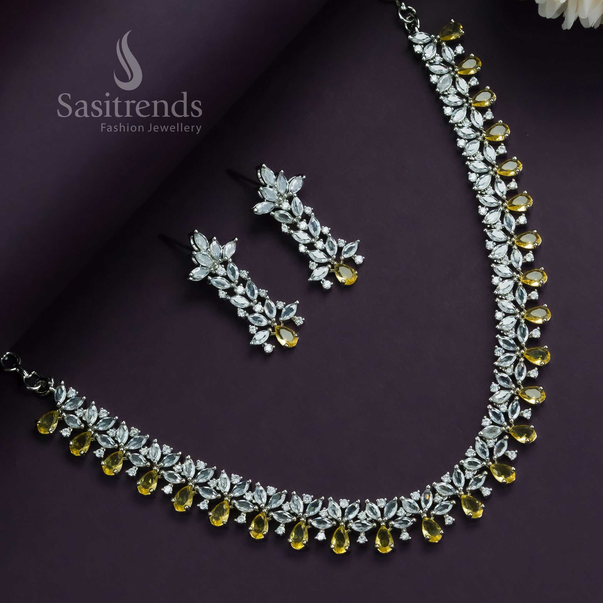LCD yellow floral jewellery set in rhodium silver finish, paired with American diamonds for a vibrant and radiant party look – Sasitrends