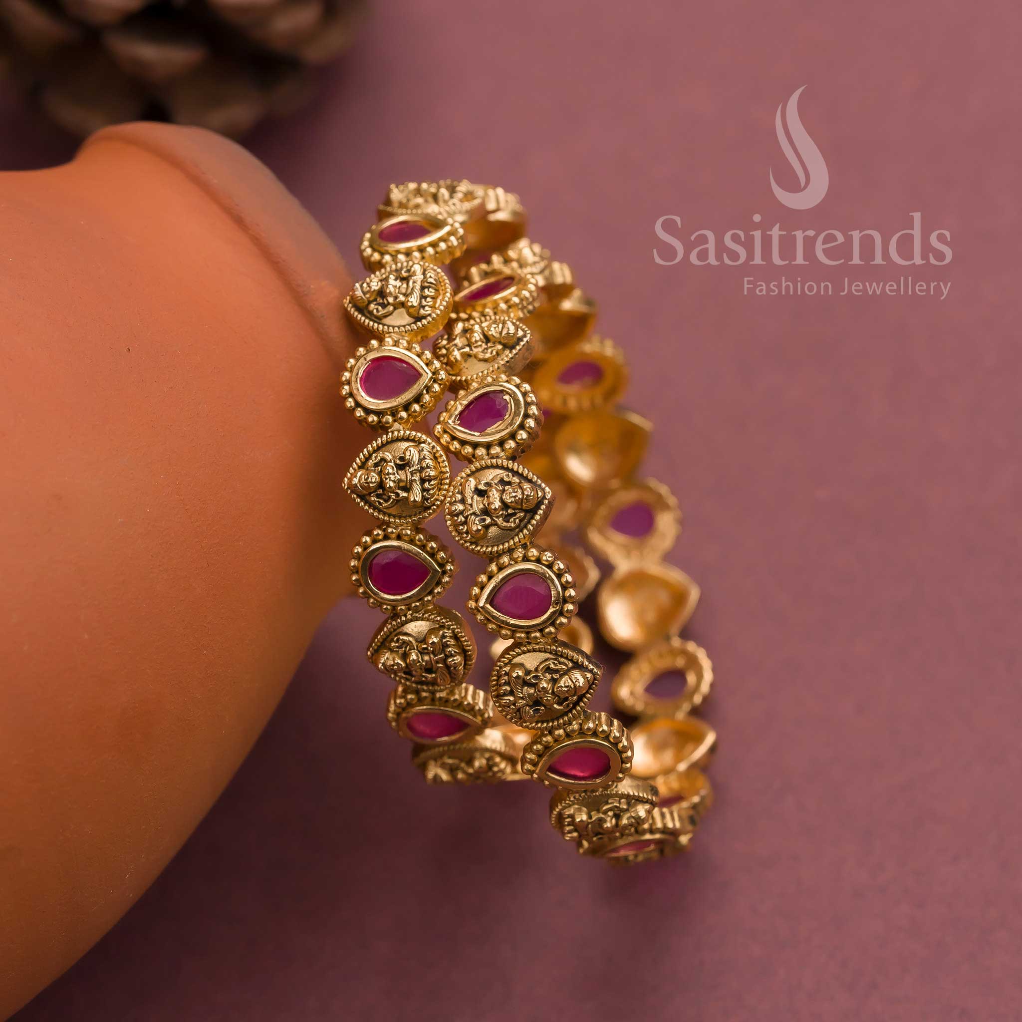 Traditional matte gold temple-style bangles with ruby red AD thilak motifs and Lakshmi carvings, perfect for wedding wear and regal South Indian jewellery appeal – sasitrends