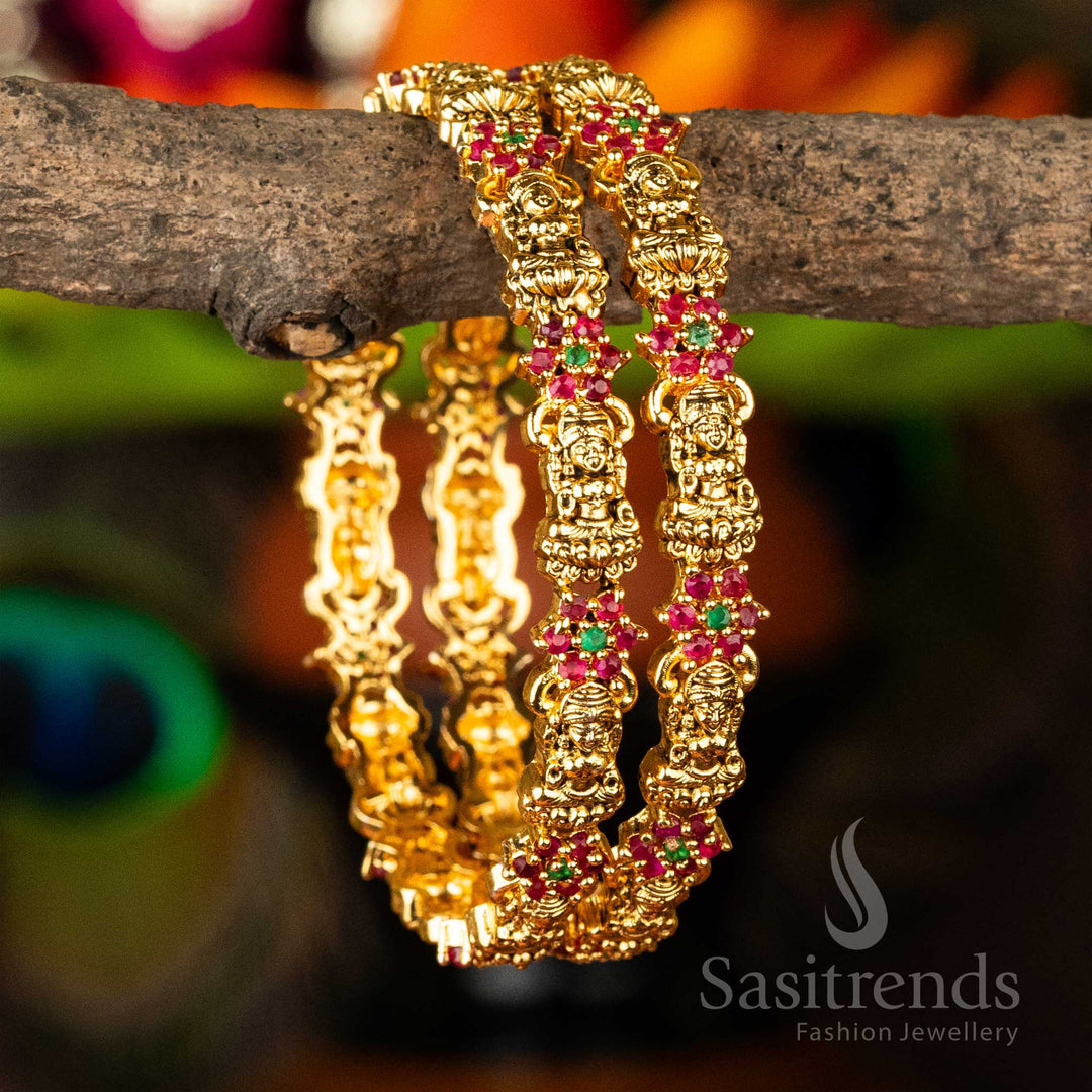Ruby-green stone studded matte finish Lakshmi and floral temple bangles featuring an ethnic royal touch and rich devotional detailing – classic traditional jewellery set by Sasitrends