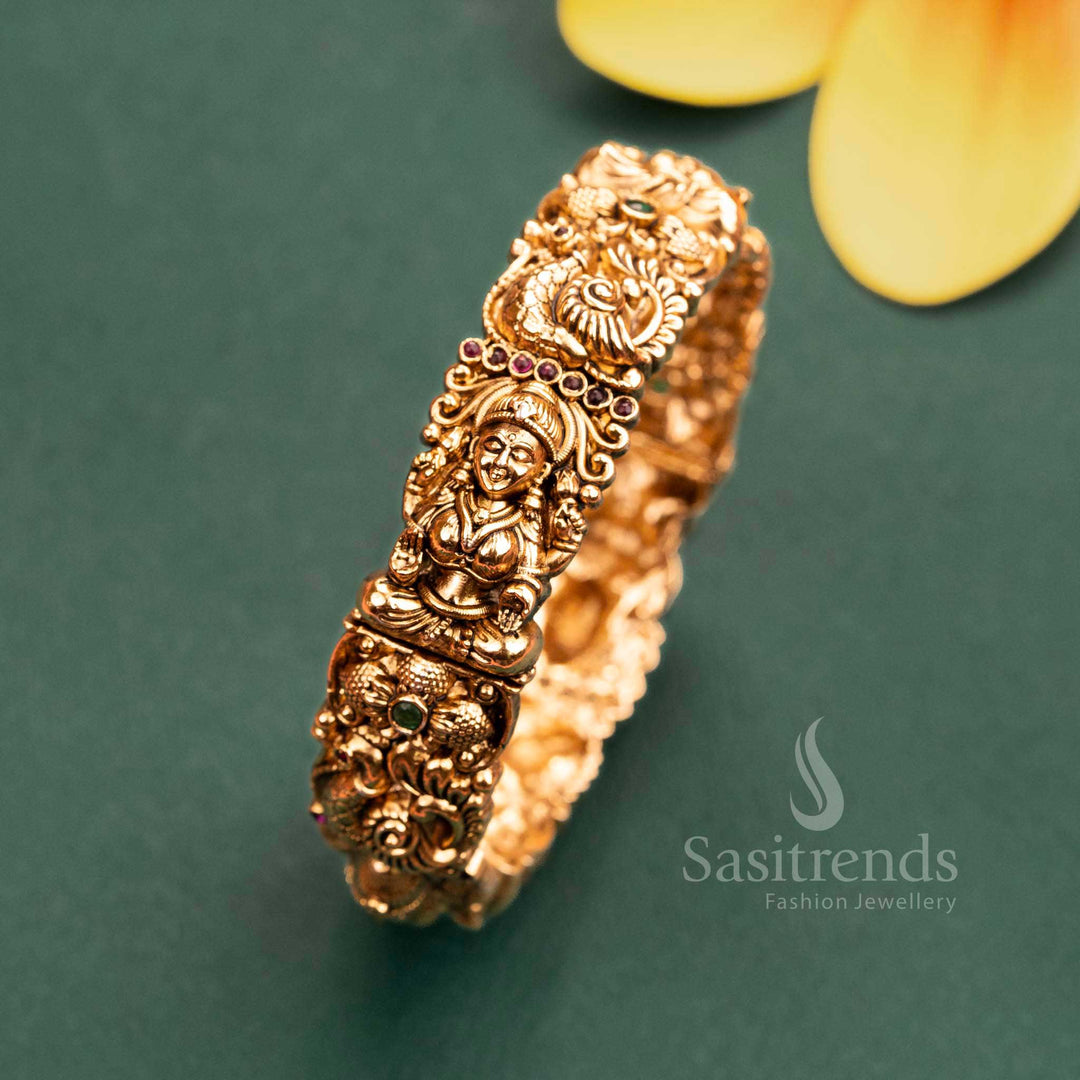 Gold Plated Lakshmi & Peacock Motif Kada Bangle with Ruby-Green Stones