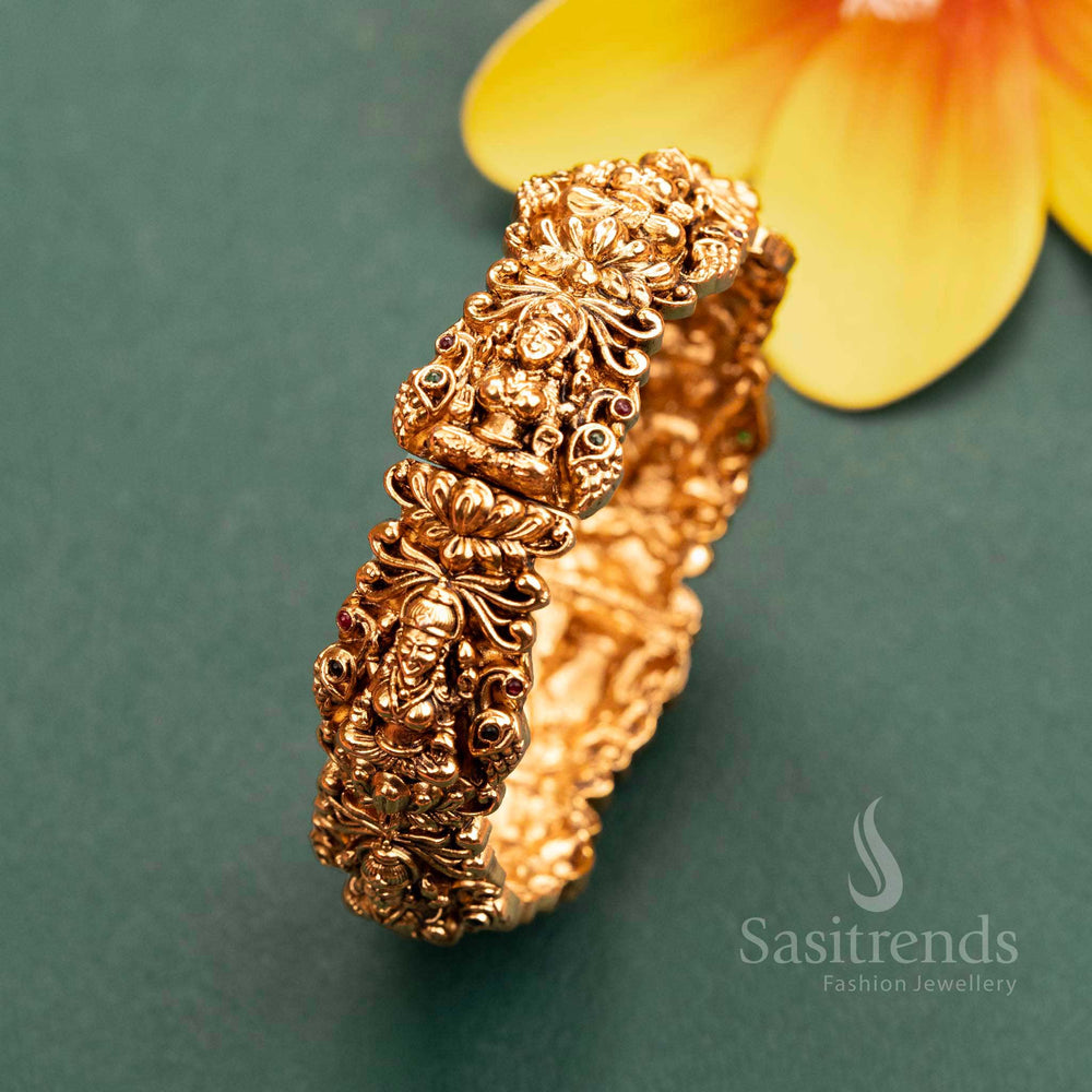 Gold Plated Lakshmi & Peacock Motif Kada Bangle Studded with Ruby-Green Stones