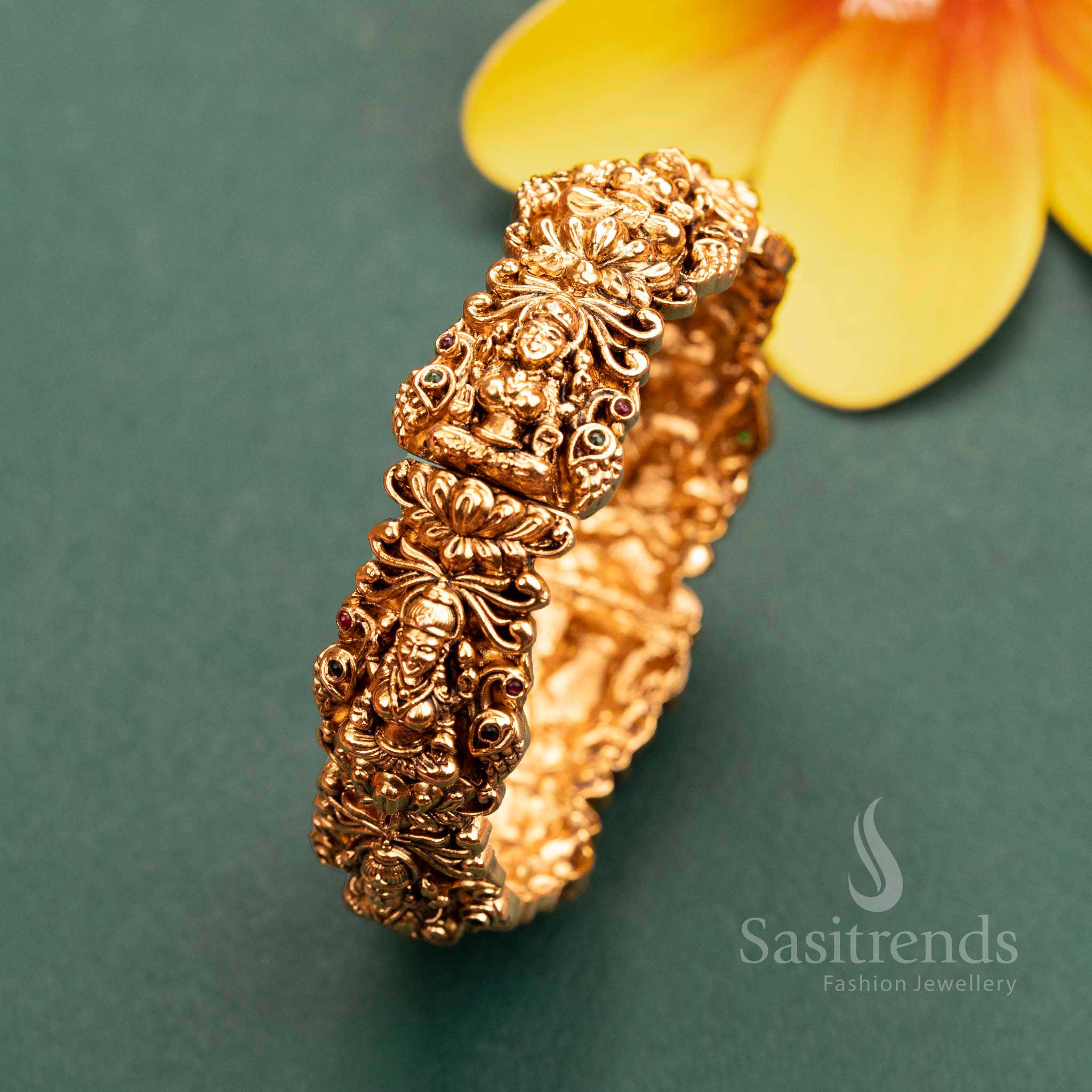Gold Plated Lakshmi & Peacock Motif Kada Bangle Studded with Ruby-Green Stones